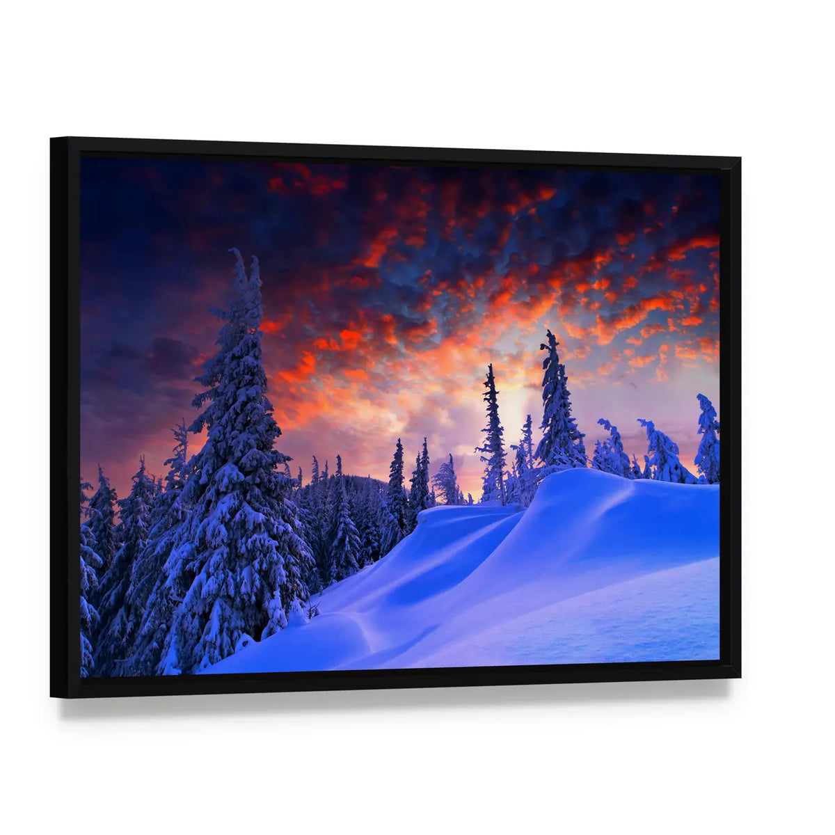Winter Sunset Over Snow-covered Pines Canvas Wall Art, framed canvas in a black floater frame, angled product view