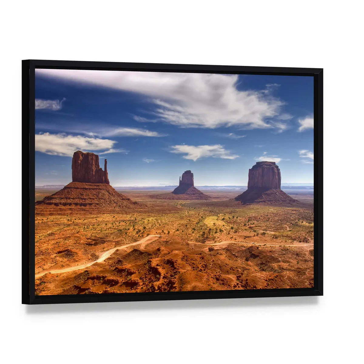 Monument Valley Buttes in Warm Desert Light Canvas Wall Art, framed canvas in a black floater frame, angled product view