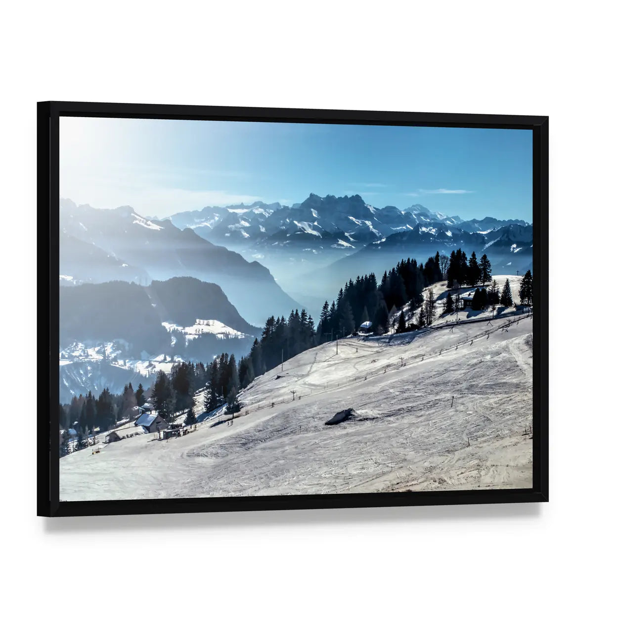 Winter Mountain Ski Slope Canvas Wall Art, framed canvas in a black floater frame, angled product view