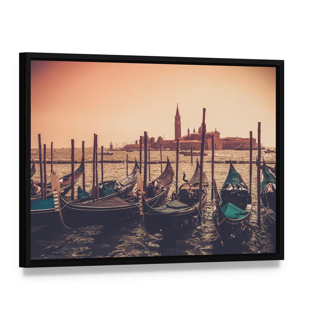 Gondolas Against Venice Panorama In Canal Canvas Wall Art, framed canvas in a black floater frame, angled product view