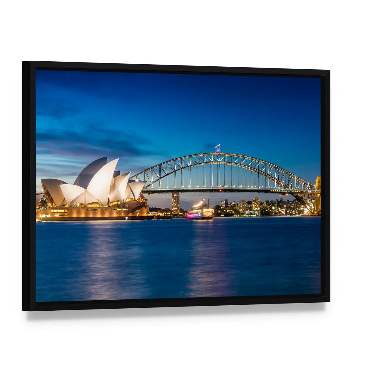 Sydney Opera House and Harbour Bridge at Night Canvas Wall Art, framed canvas in a black floater frame, angled product view