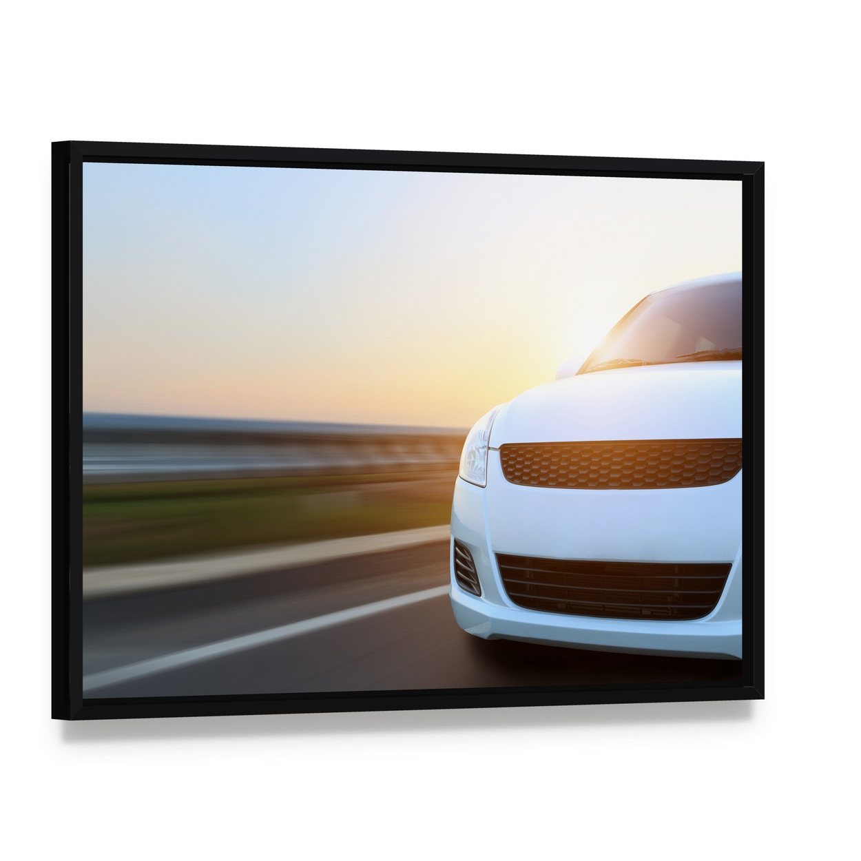 Car Speeding at Sunset Canvas Wall Art, framed canvas in a black floater frame, angled product view