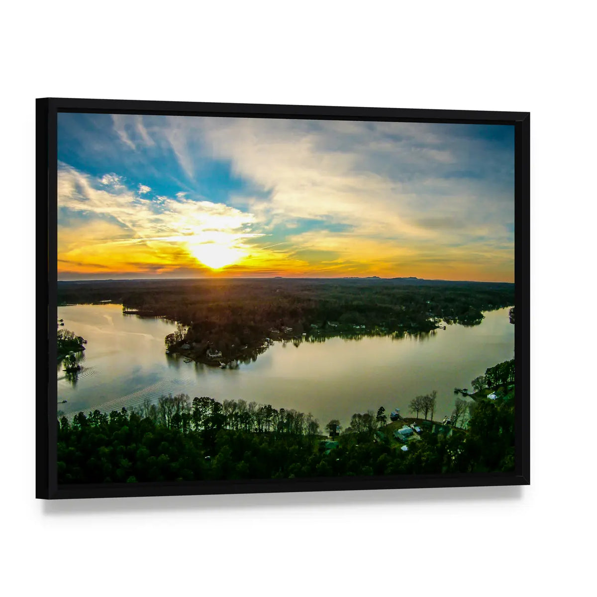 Sunset Over a Calm Lake Canvas Wall Art, framed canvas in a black floater frame, angled product view