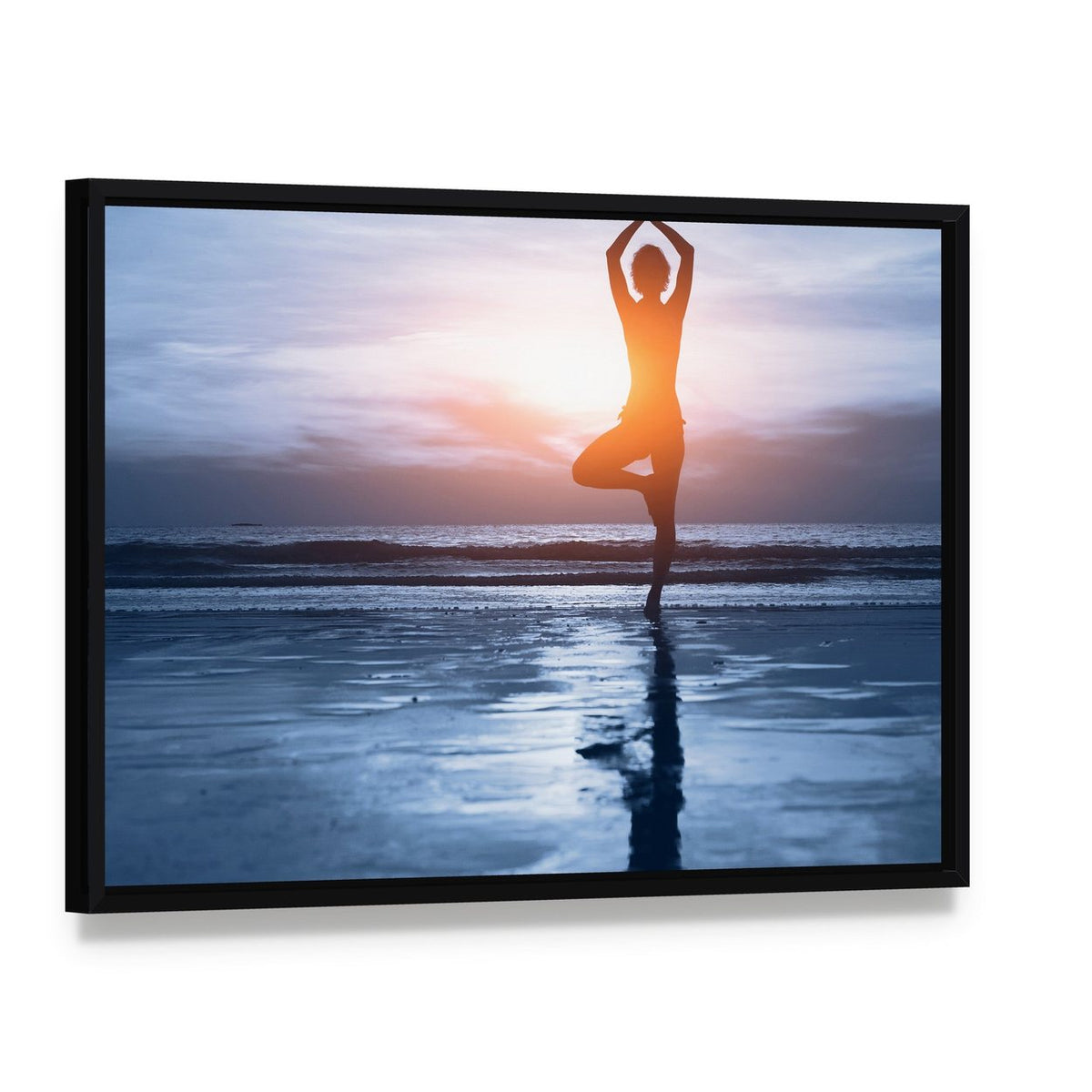 Woman Practicing Yoga at the Beach Canvas Wall Art, framed canvas in a black floater frame, angled product view