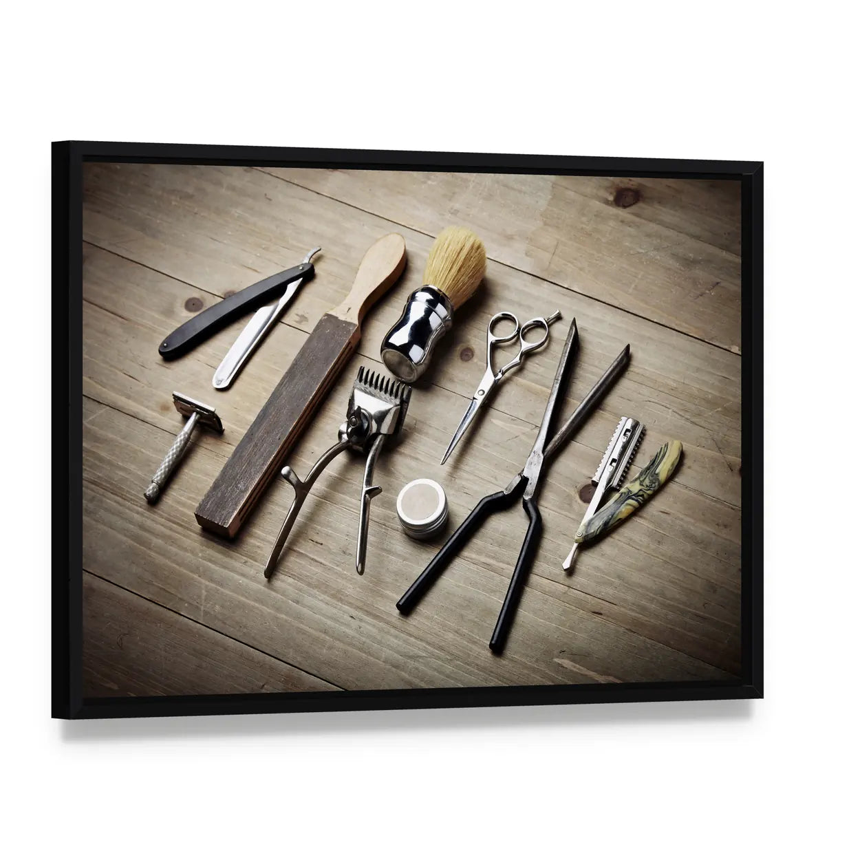 Vintage Barber Tools Flat Lay Canvas Wall Art, framed canvas in a black floater frame, angled product view