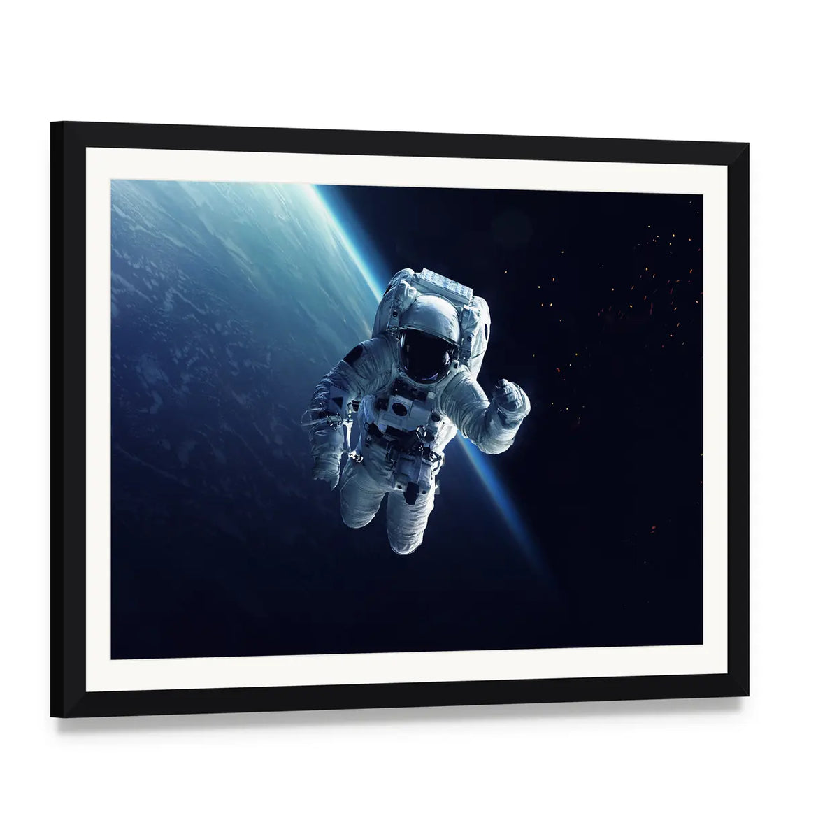 Astronaut in Space Canvas Wall Art, framed print with white mat and black frame, angled product view