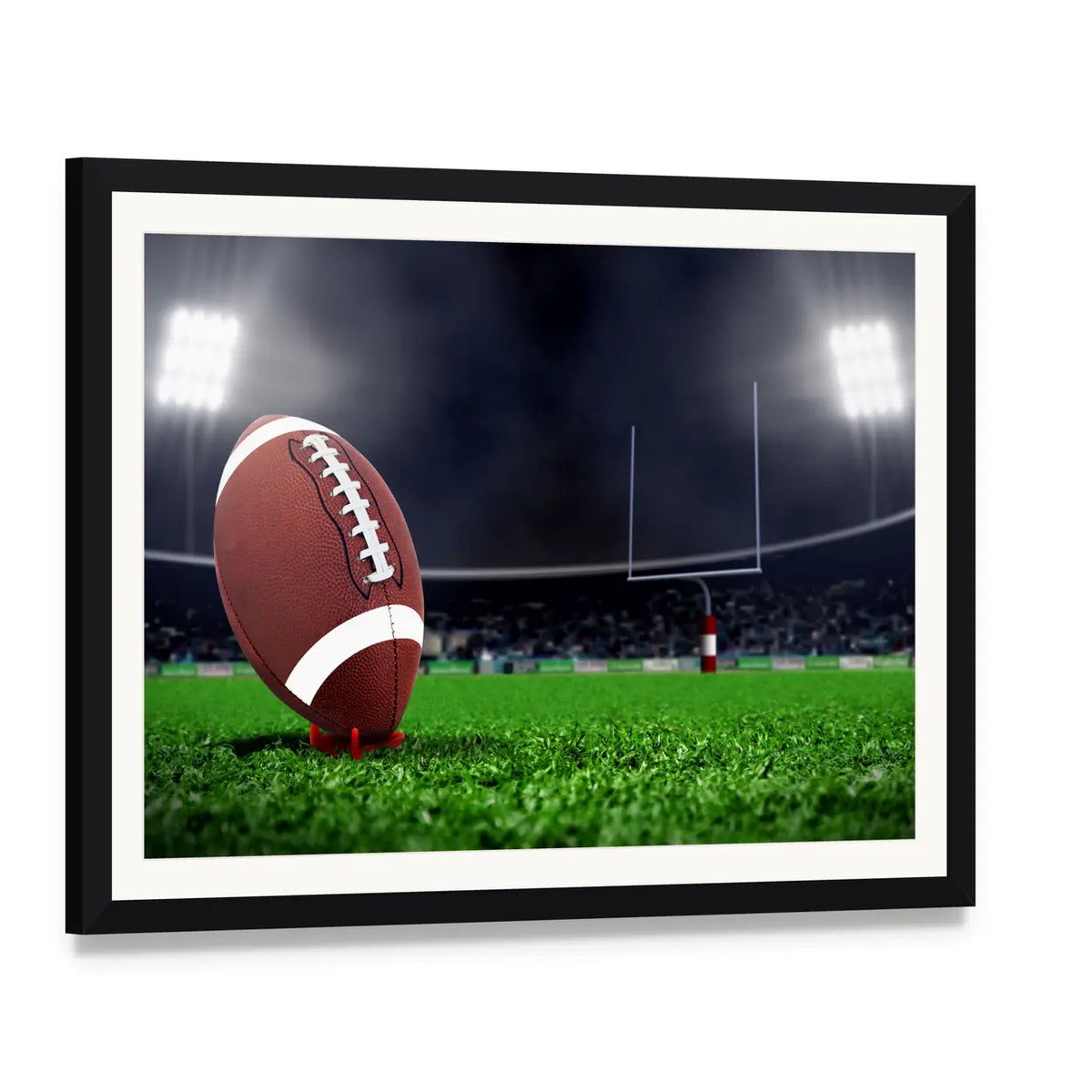 Football on Green Field Canvas Wall Art, framed print with white mat and black frame, angled product view