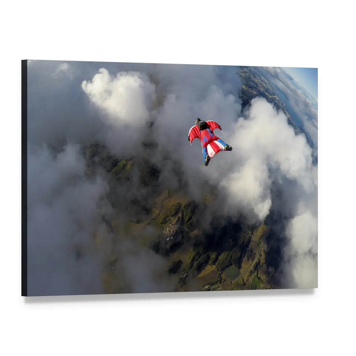 Red and Blue Wingsuit Flyer Over Terrain Canvas Wall Art, single panel gallery wrapped canvas, angled product view