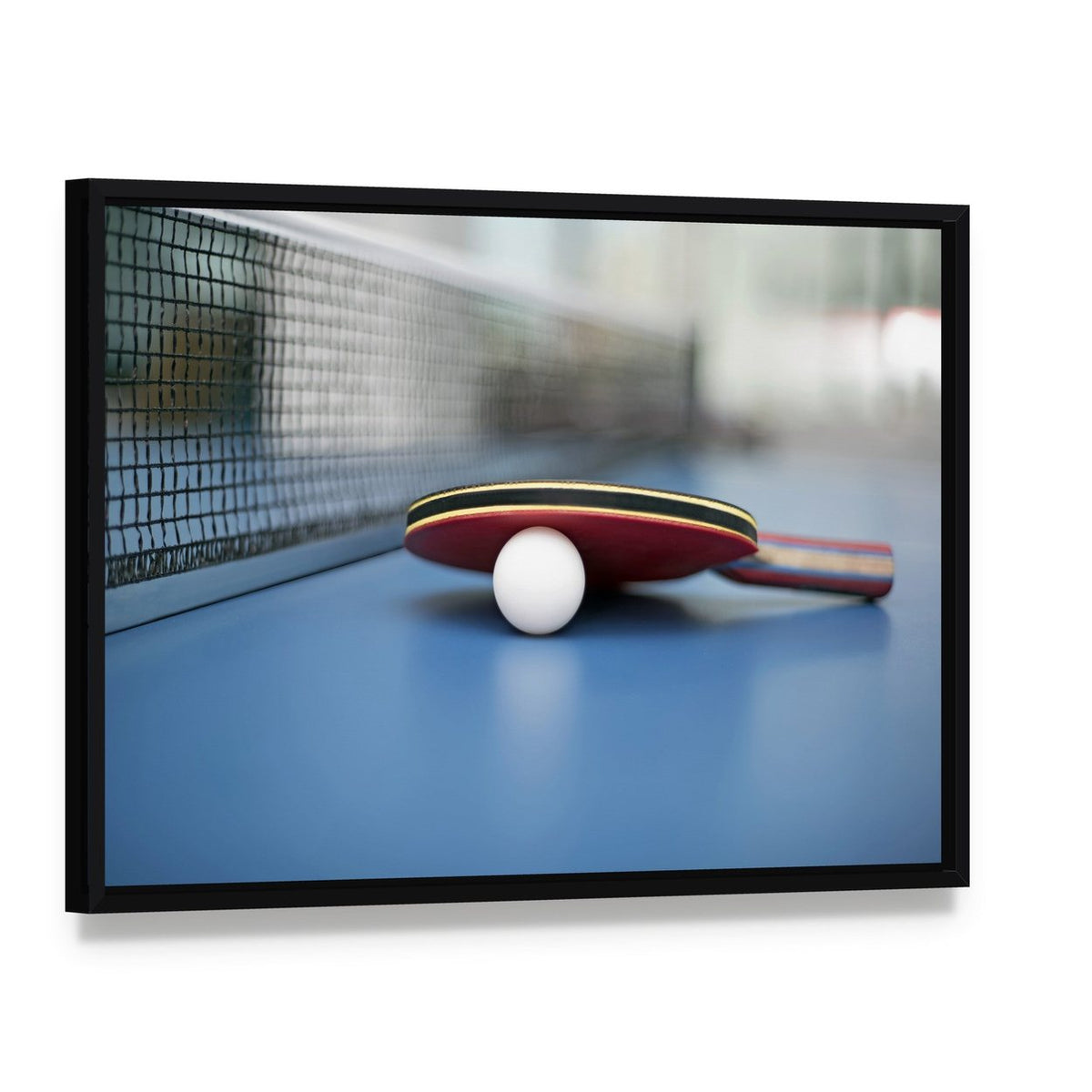 Table Tennis Ball and Bat Canvas Wall Art, framed canvas in a black floater frame, angled product view