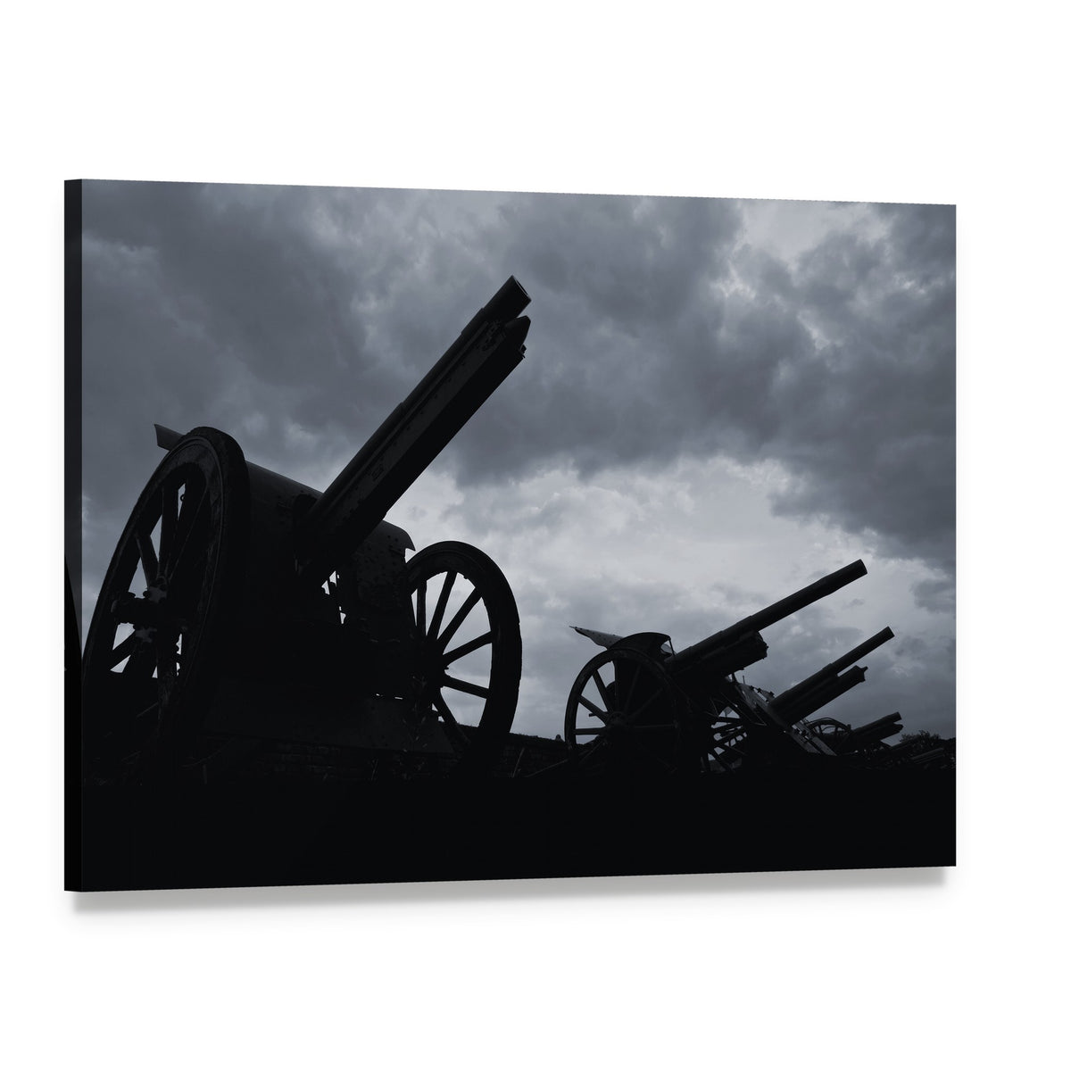 Cannon Silhouettes Against Stormy Sky Canvas Wall Art, single panel gallery wrapped canvas, angled product view