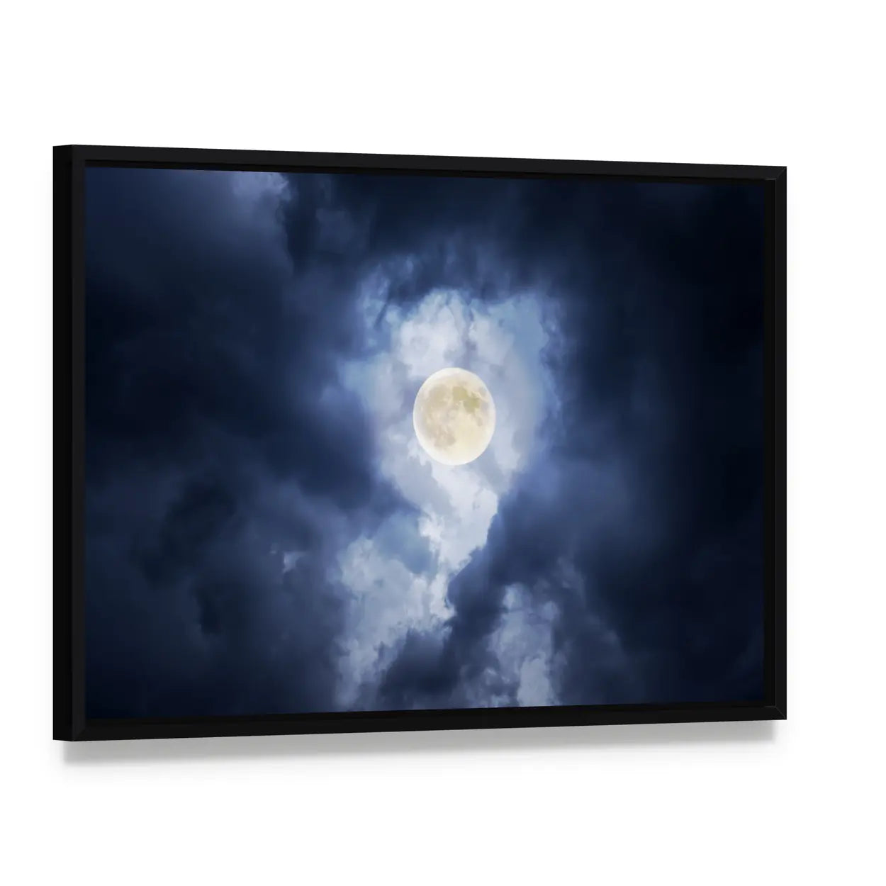 Supermoon in Clouds Canvas Wall Art, framed canvas in a black floater frame, angled product view