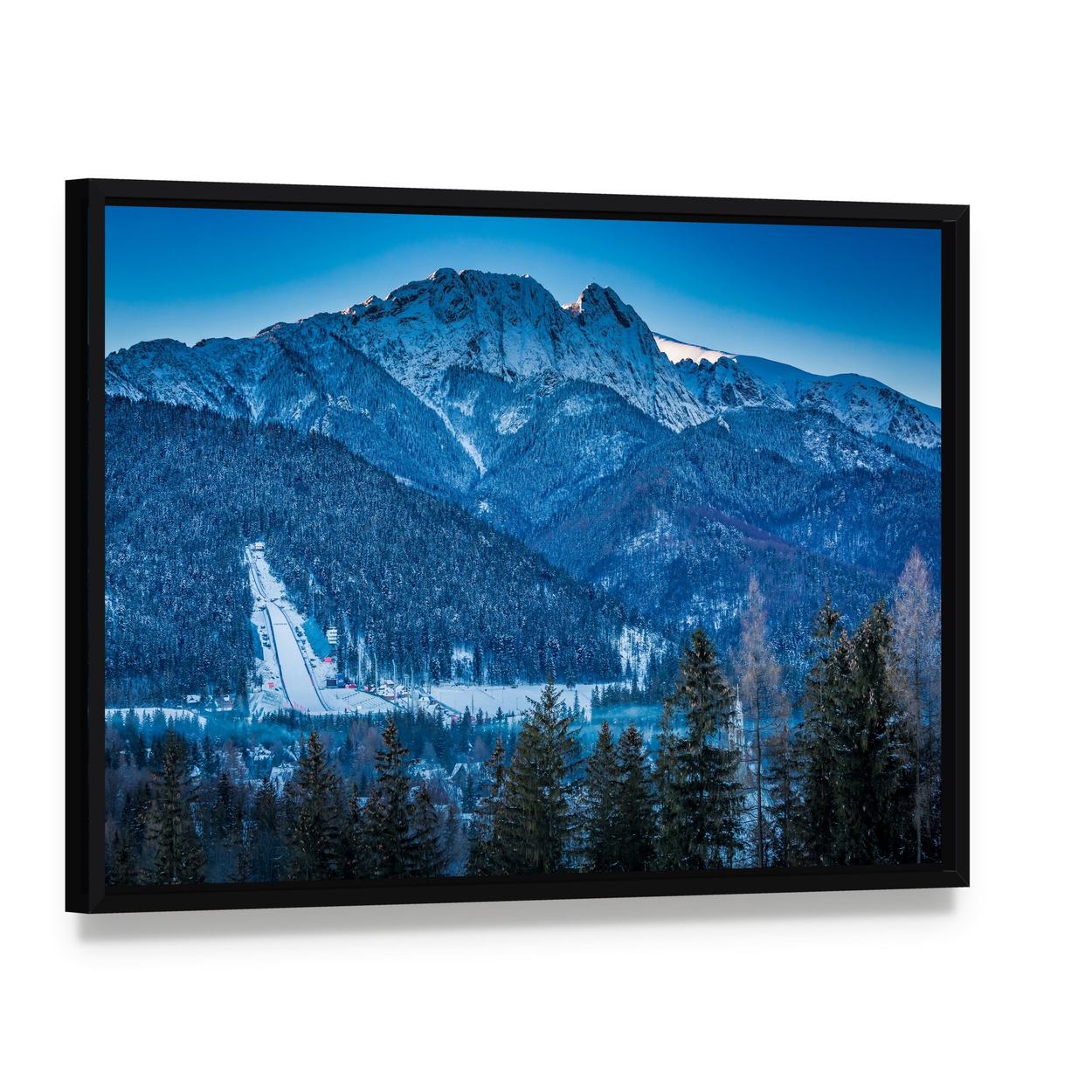 Giewont Peak in Winter Canvas Wall Art, framed canvas in a black floater frame, angled product view