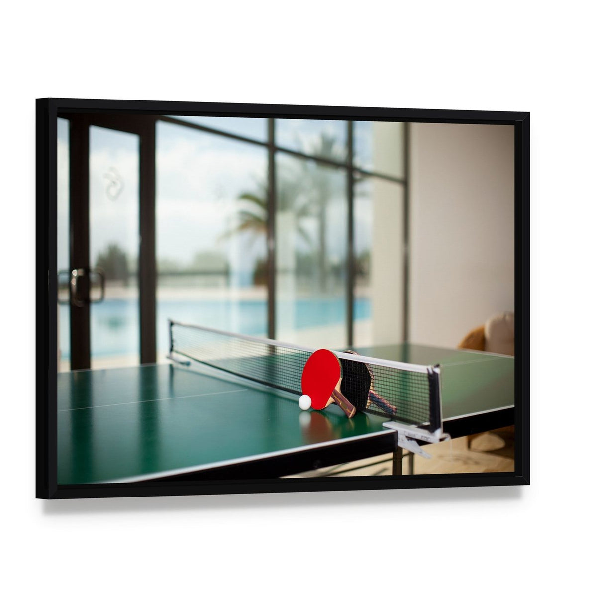 Table Tennis Rackets on Table Canvas Wall Art, framed canvas in a black floater frame, angled product view
