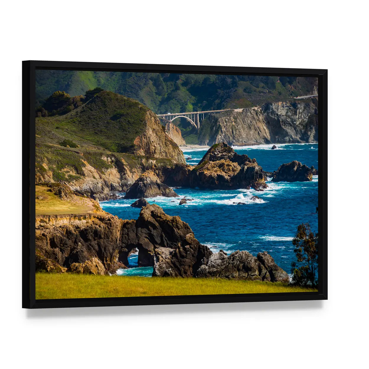 Bixby Creek Bridge Canvas Wall Art, framed canvas in a black floater frame, angled product view