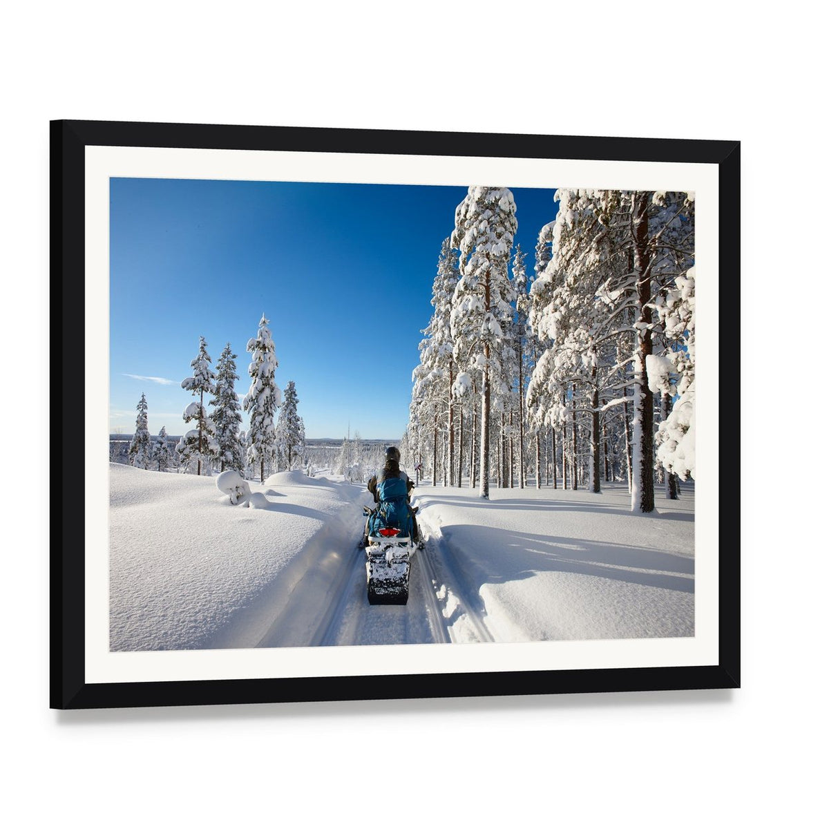 Snowmobile Adventure in Finnish Lapland Canvas Wall Art, framed print with white mat and black frame, angled product view