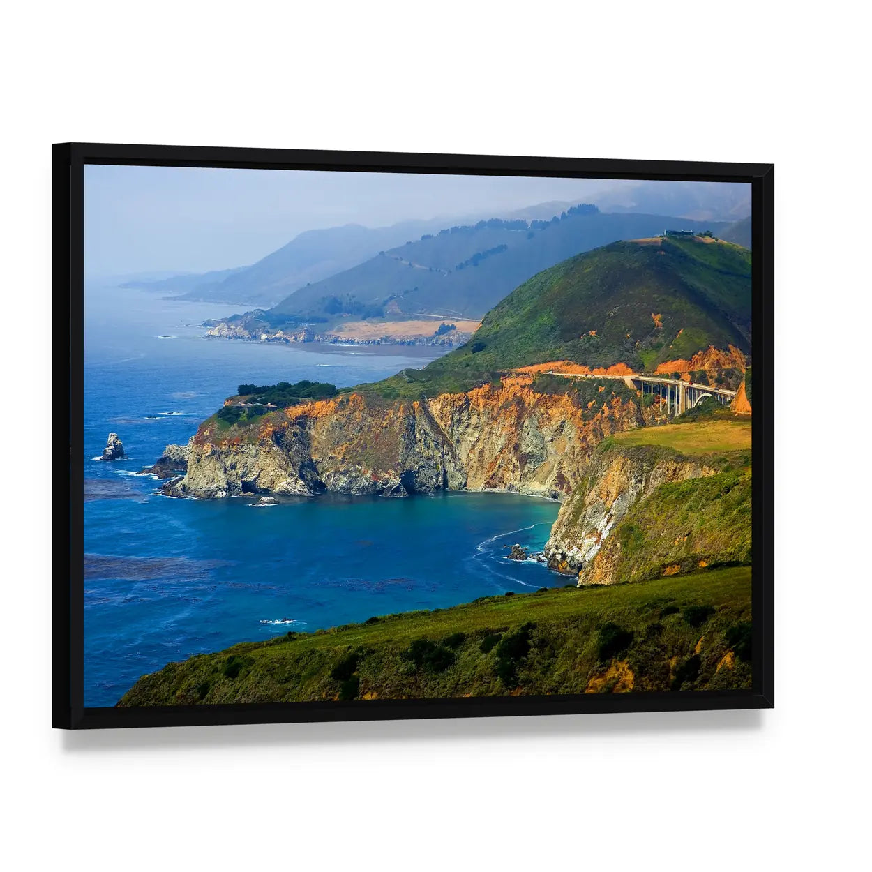 Big Sur Coast and Bixby Creek Bridge Canvas Wall Art, framed canvas in a black floater frame, angled product view