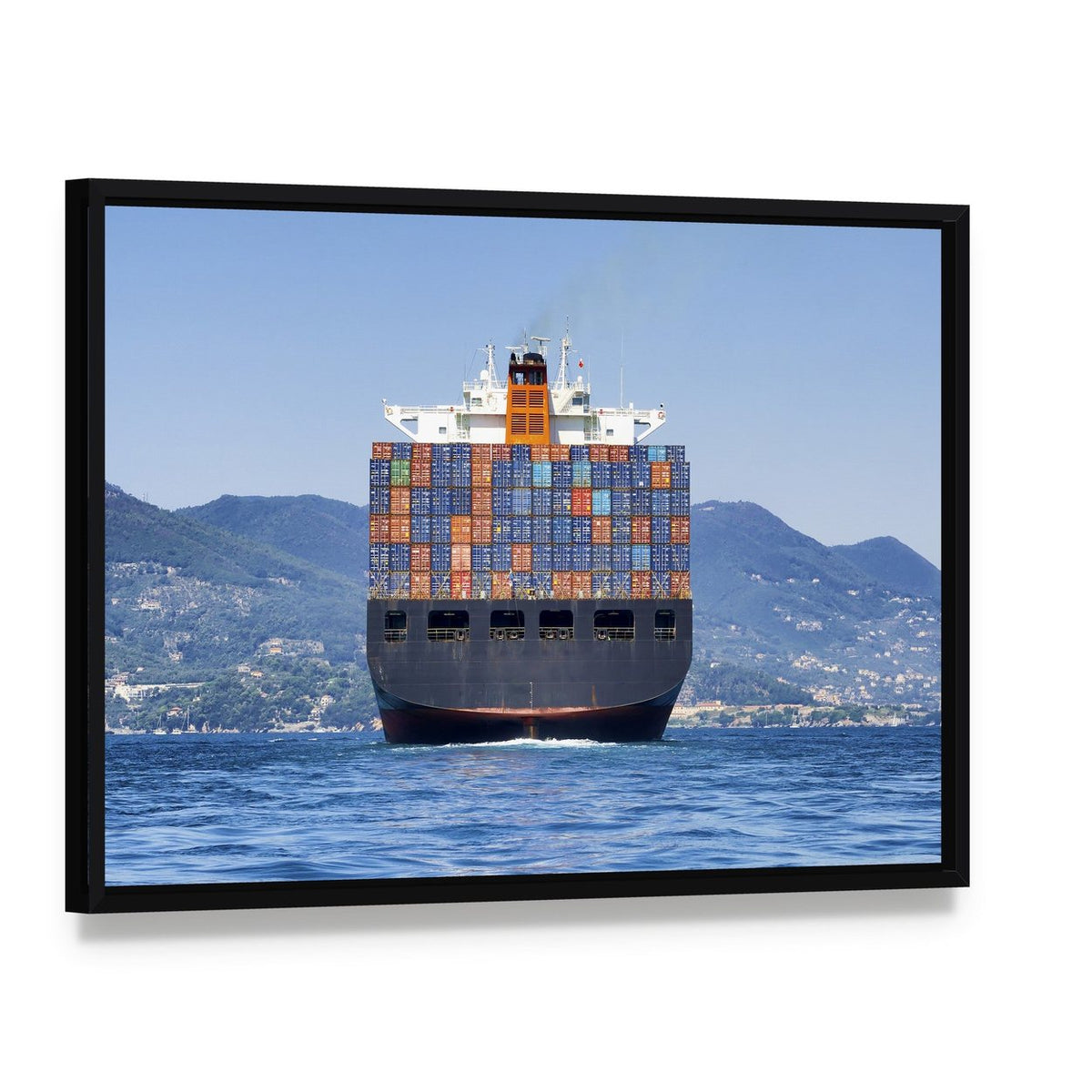 Cargo Container Ship at Sea Canvas Wall Art, framed canvas in a black floater frame, angled product view