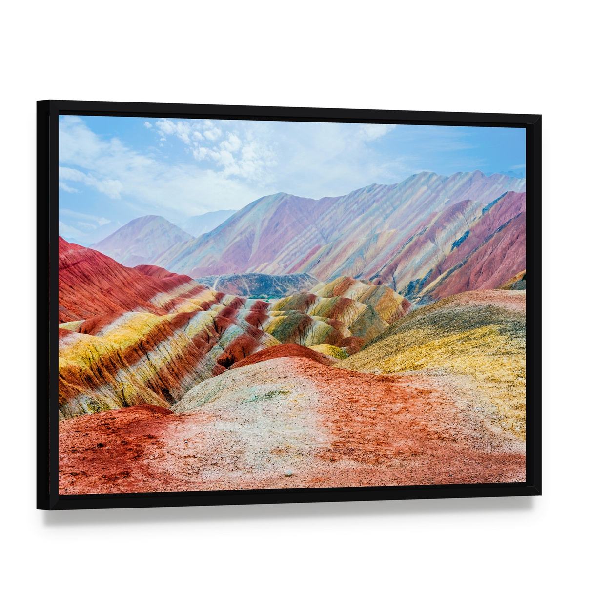 Zhangye Rainbow Mountains Under Daylight Canvas Wall Art, framed canvas in a black floater frame, angled product view