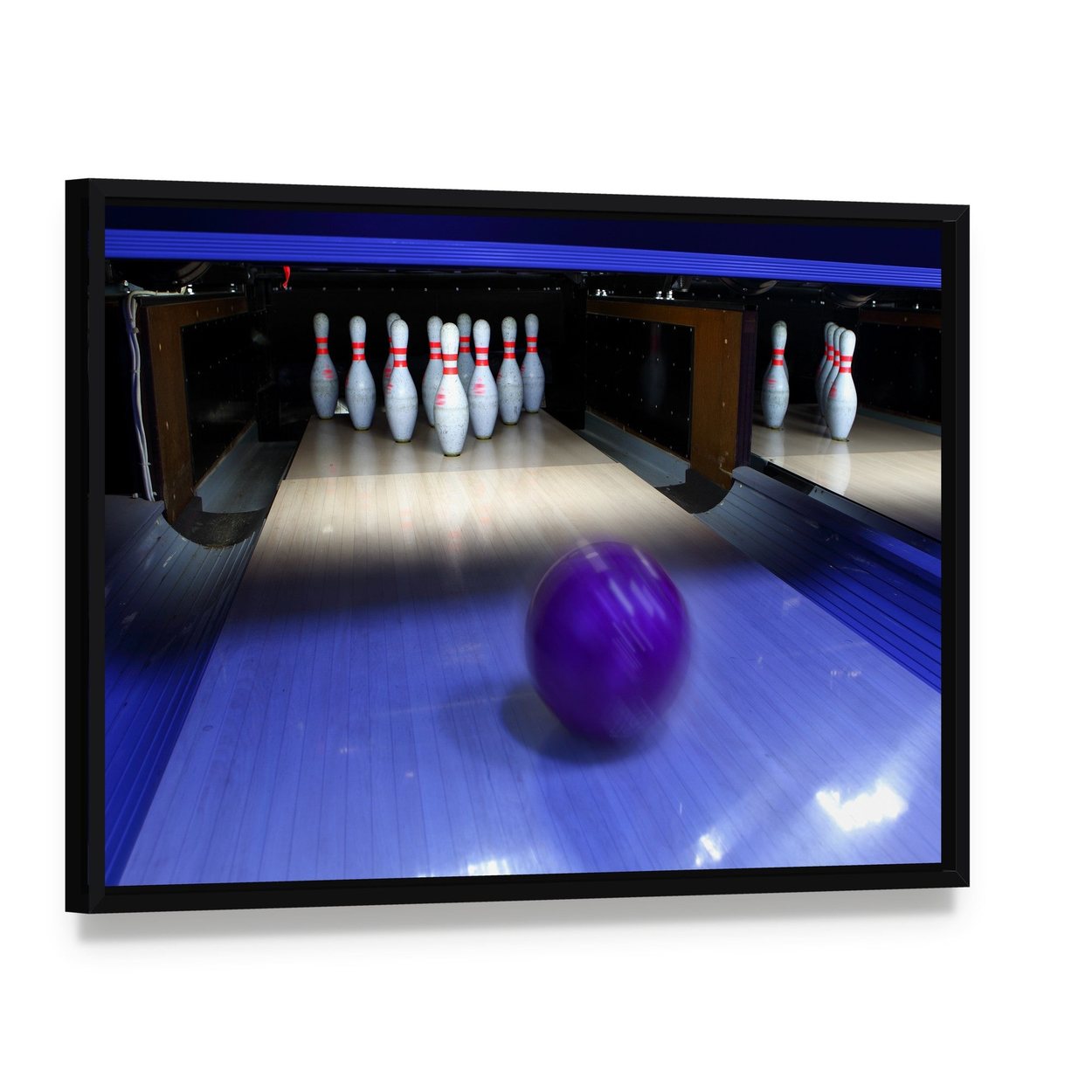 Bowling Ball and Pins Canvas Wall Art, framed canvas in a black floater frame, angled product view