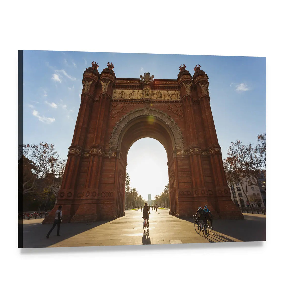 Sunlit Cyclist at Arc De Triomf Canvas Wall Art, single panel gallery wrapped canvas, angled product view