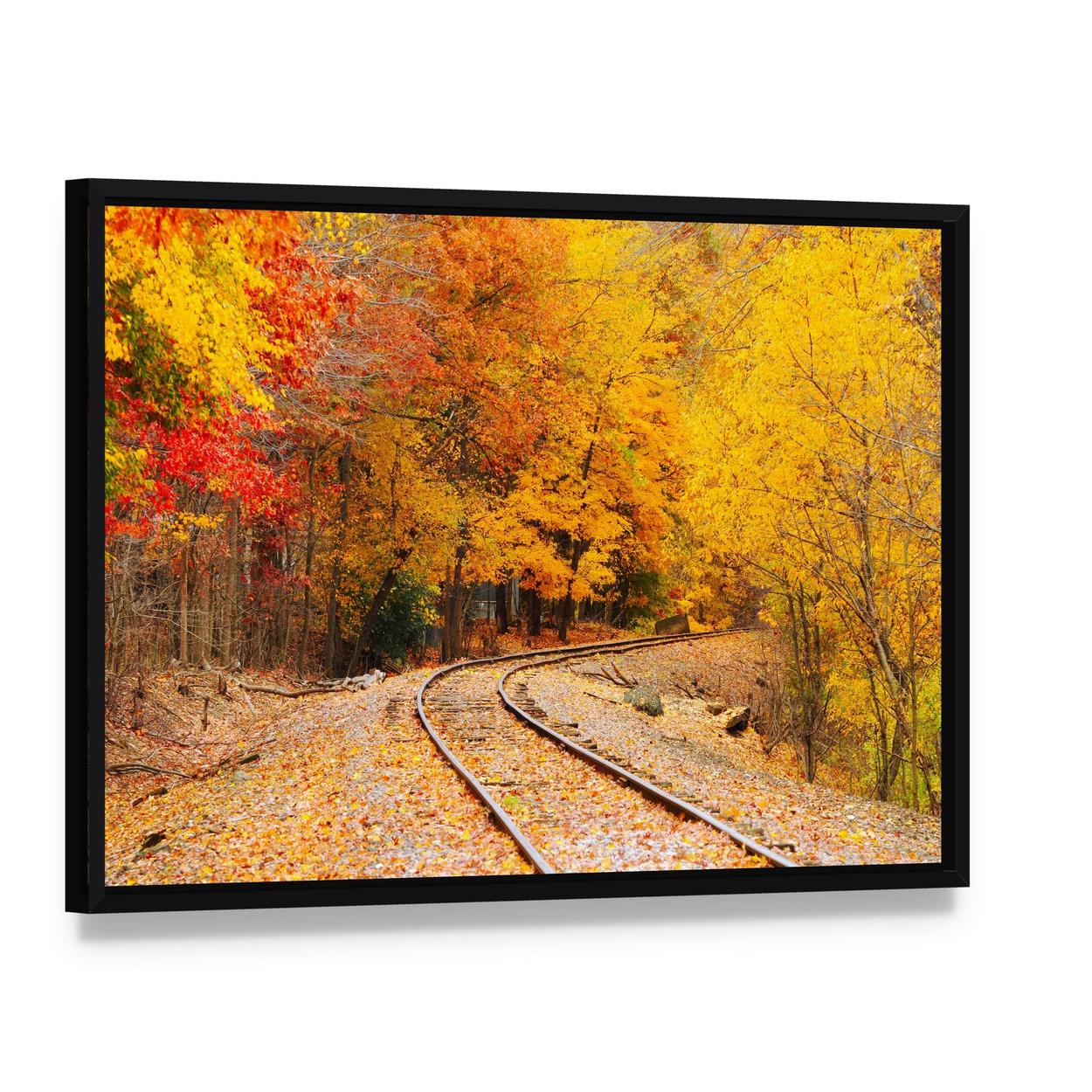 Railroad Track in Autumn Canvas Wall Art, framed canvas in a black floater frame, angled product view