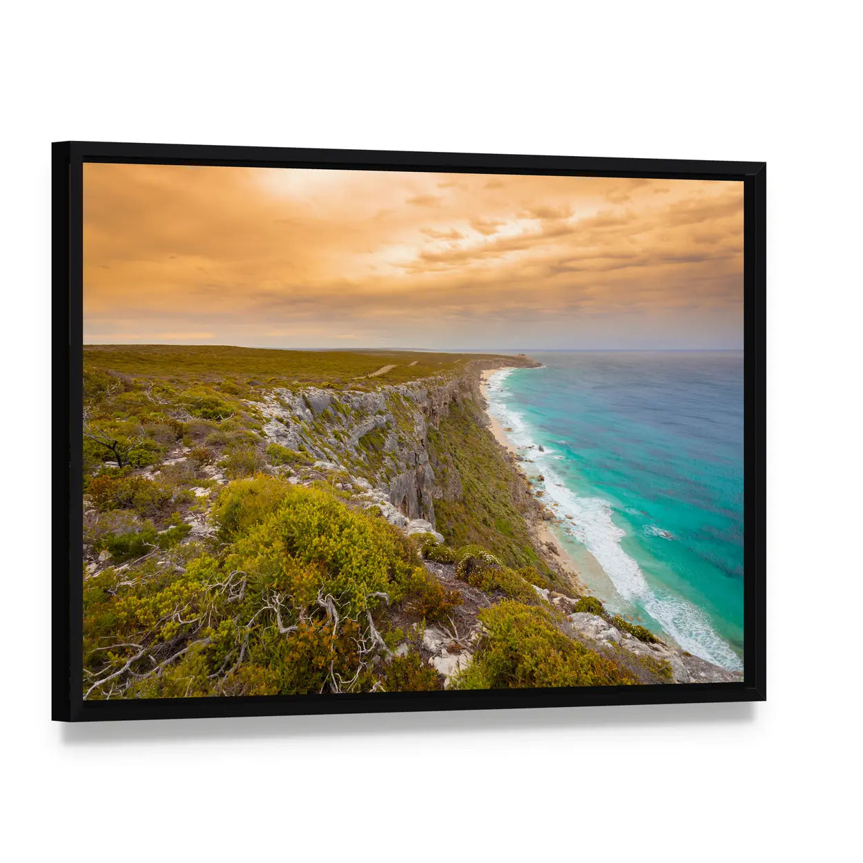 Kangaroo Island Cliffs and Turquoise Sea at Sunset Canvas Wall Art, framed canvas in a black floater frame, angled product view