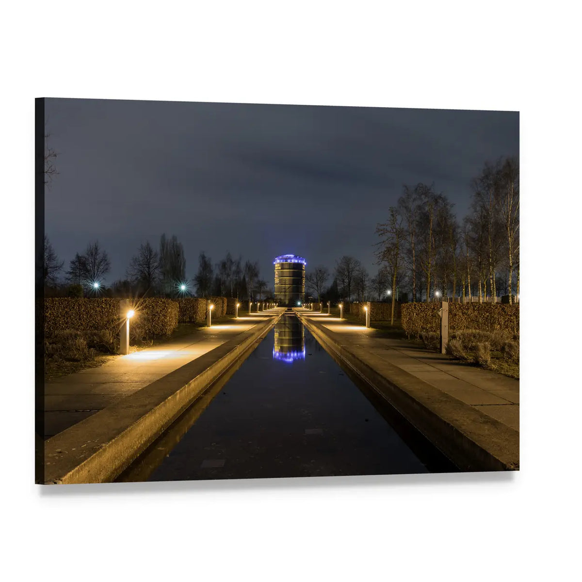 Blue-lit Gasometer with Reflecting Water Canvas Wall Art, single panel gallery wrapped canvas, angled product view