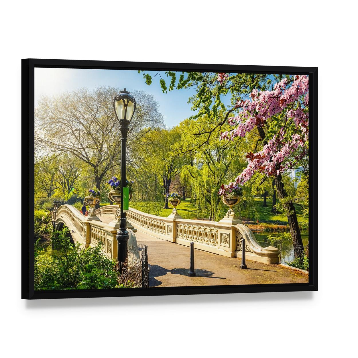 Bow Bridge in Central Park Canvas Wall Art, framed canvas in a black floater frame, angled product view