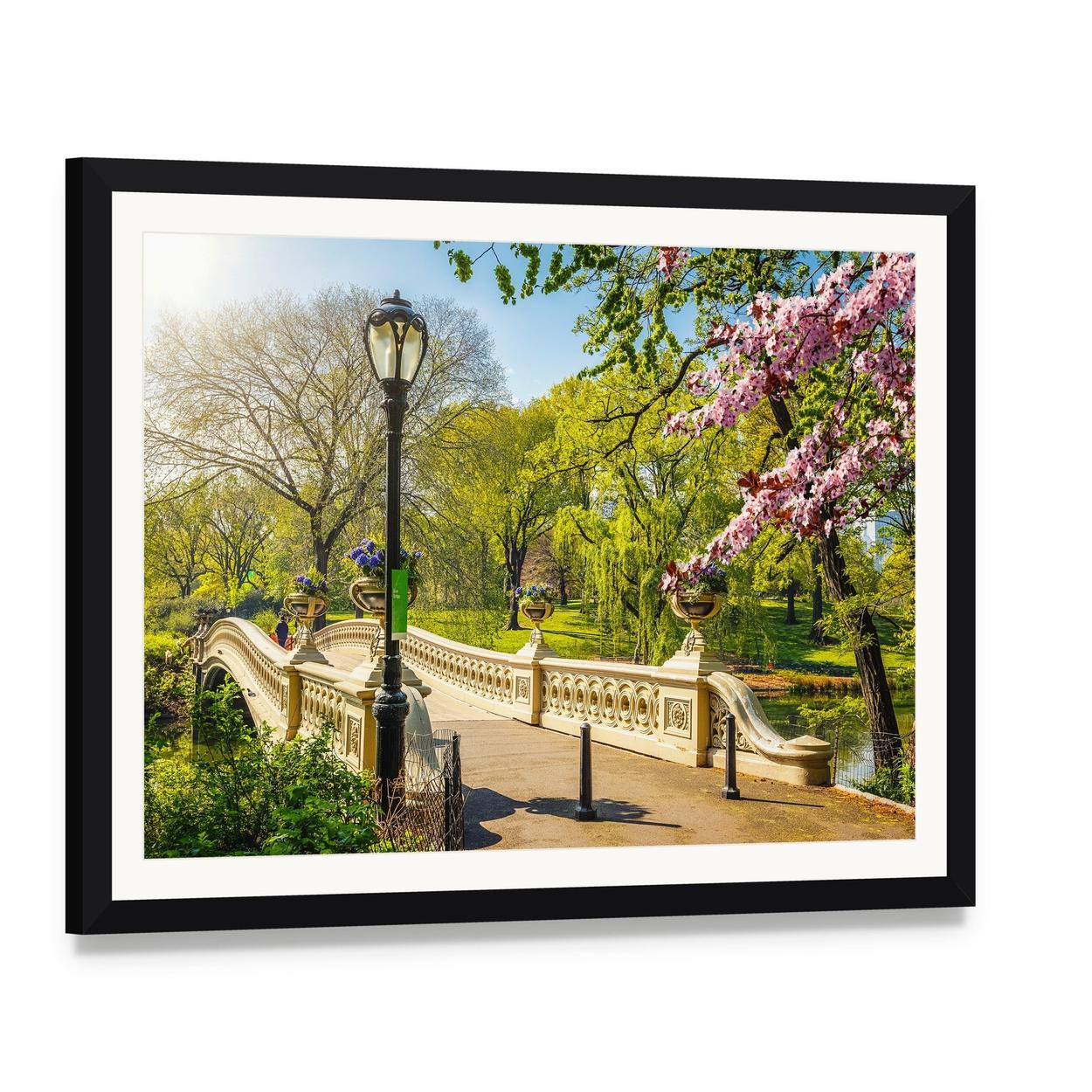 Bow Bridge in Central Park Canvas Wall Art, framed print with white mat and black frame, angled product view