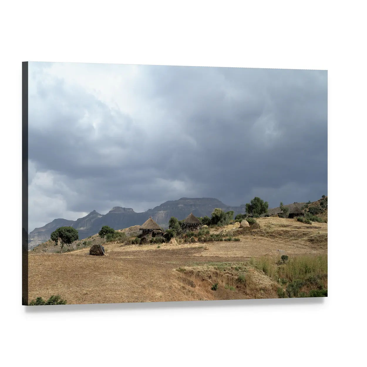 Thatched Huts in Rural Africa Canvas Wall Art, single panel gallery wrapped canvas, angled product view
