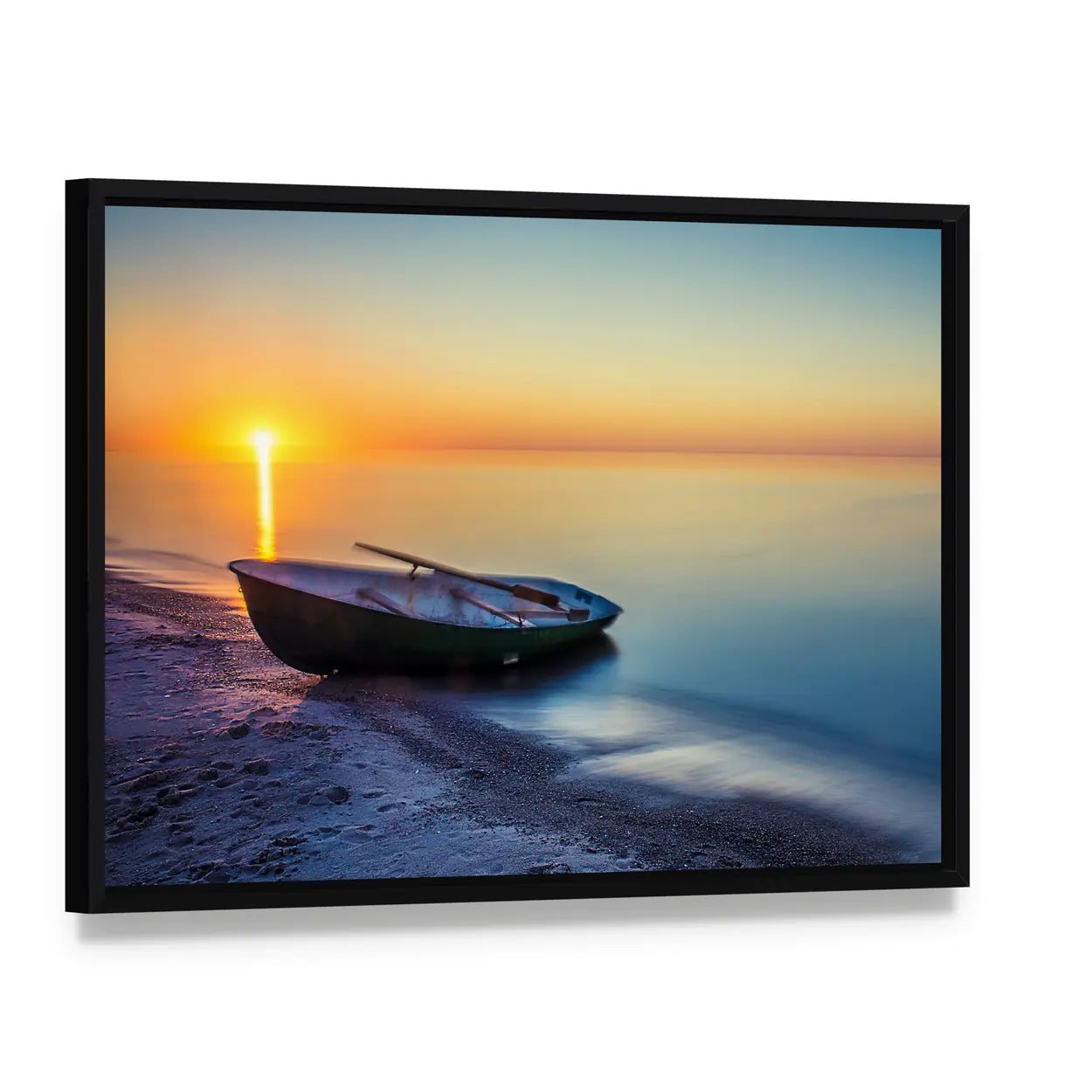 Sunset Rowboat Seascape Canvas Wall Art, framed canvas in a black floater frame, angled product view