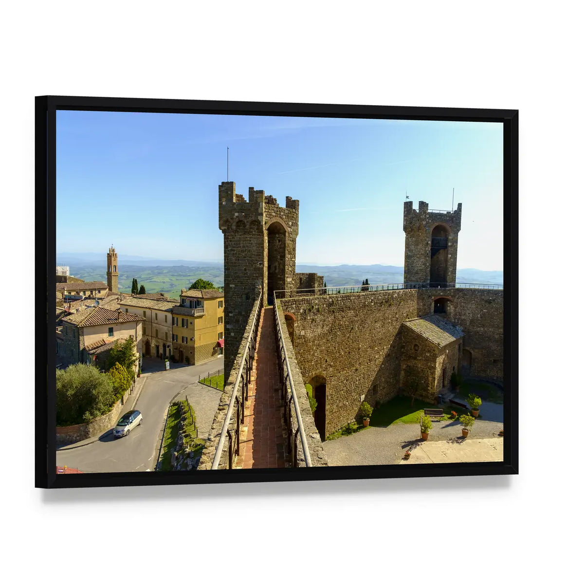 Montalcino Castle Canvas Wall Art, framed canvas in a black floater frame, angled product view