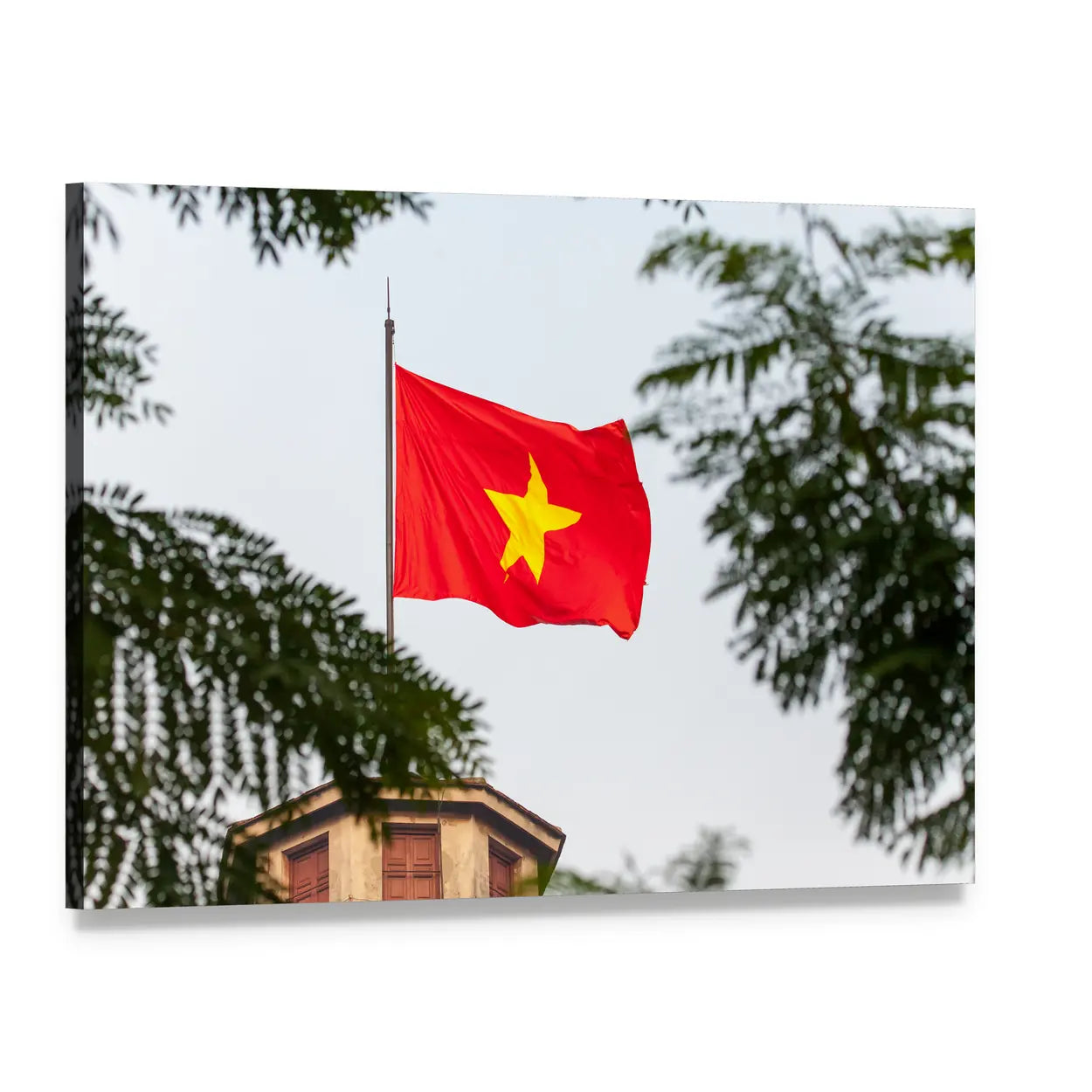 Vietnam Flag Over Tree-framed Rooftop Canvas Wall Art, single panel gallery wrapped canvas, angled product view