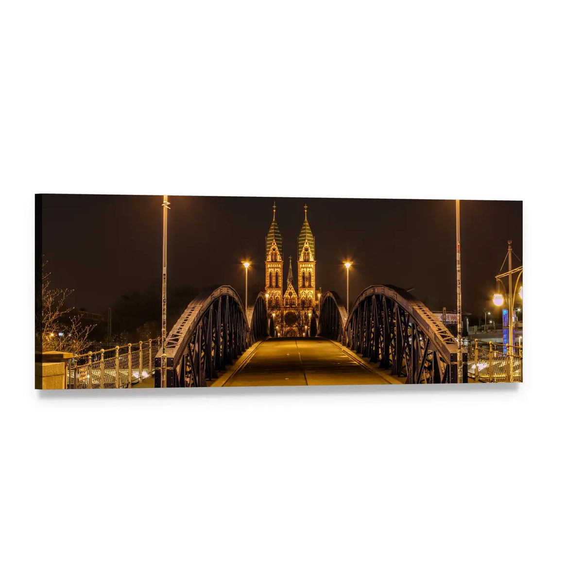 Illuminated Bridge and Twin-spired Cathedral at Night Panoramic Canvas Wall Art, single panel gallery wrapped canvas, angled product view