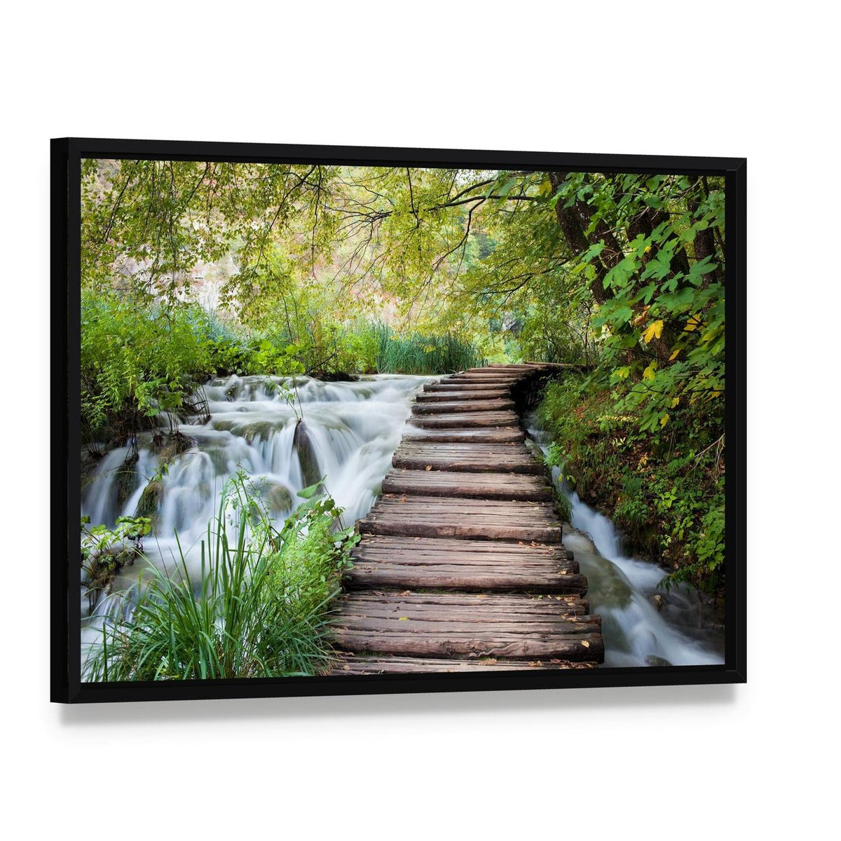 Wooden Path Along the Stream in Forest Canvas Wall Art, framed canvas in a black floater frame, angled product view