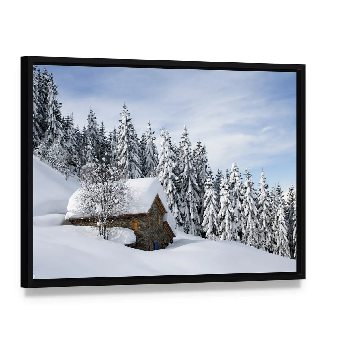 Alpine Hut Under Snow Canvas Wall Art, framed canvas in a black floater frame, angled product view
