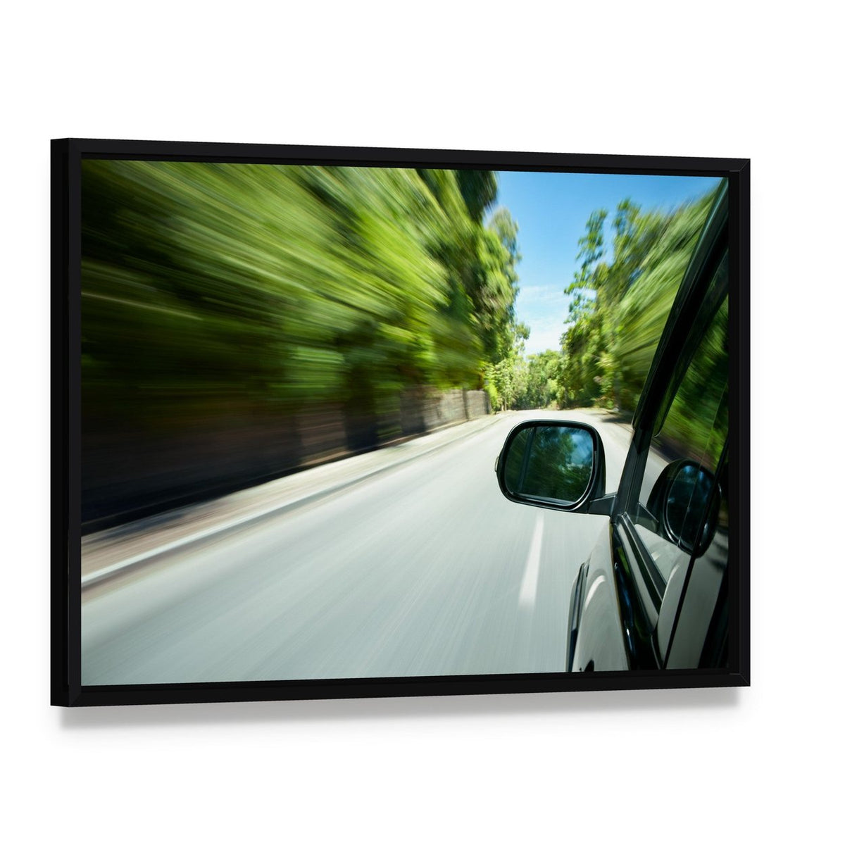 Car Speeding on Road Canvas Wall Art, framed canvas in a black floater frame, angled product view
