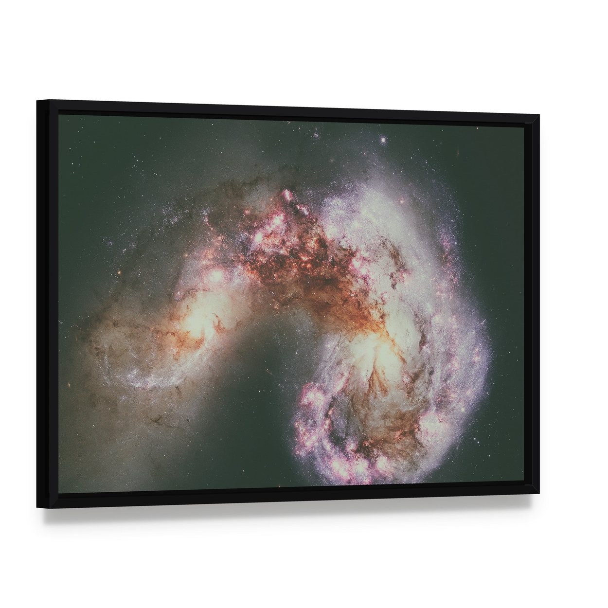 The Antennae Galaxies Canvas Wall Art, framed canvas in a black floater frame, angled product view