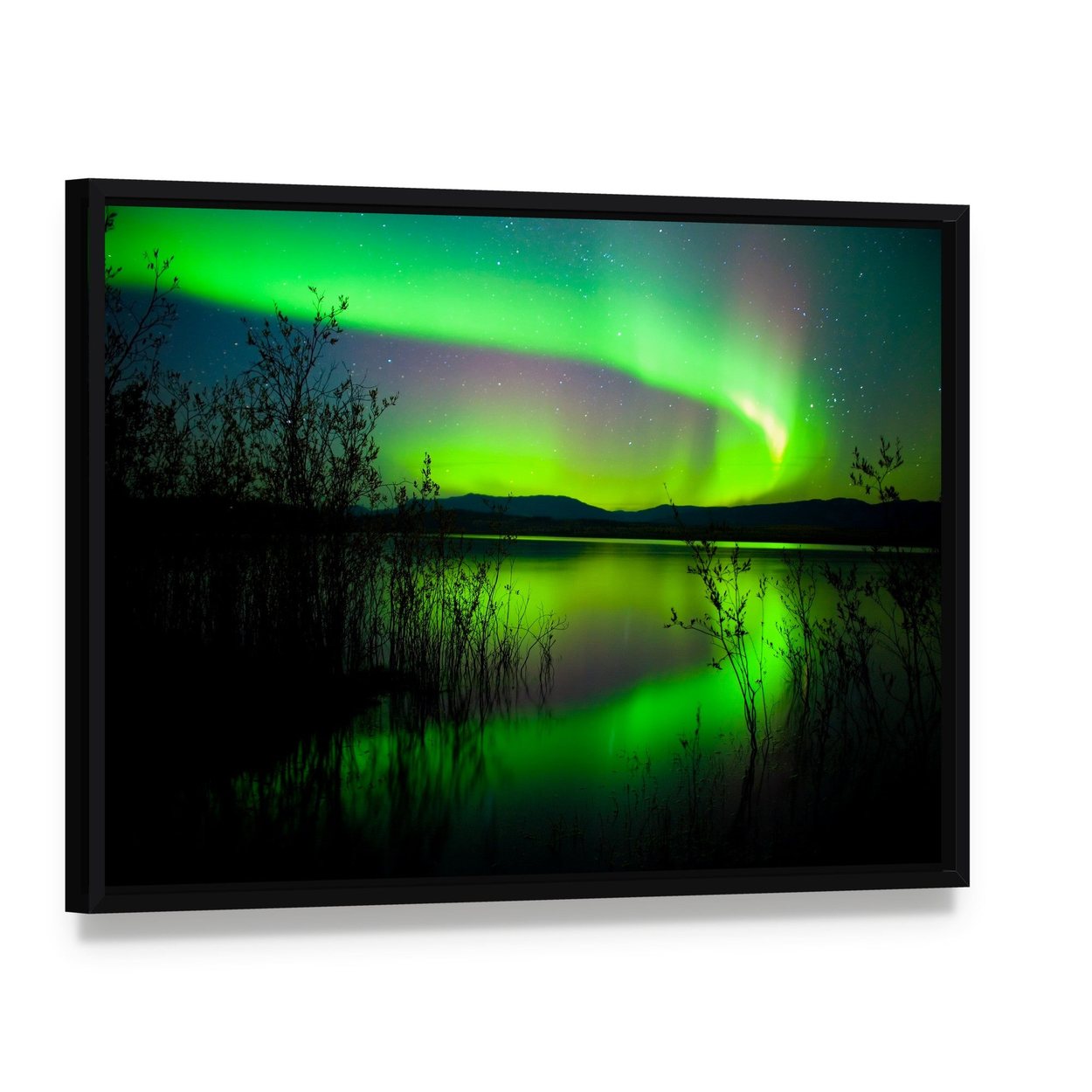 Silhouettes of Intense Northern Lights Over Lake Laberge Canvas Wall Art, framed canvas in a black floater frame, angled product view