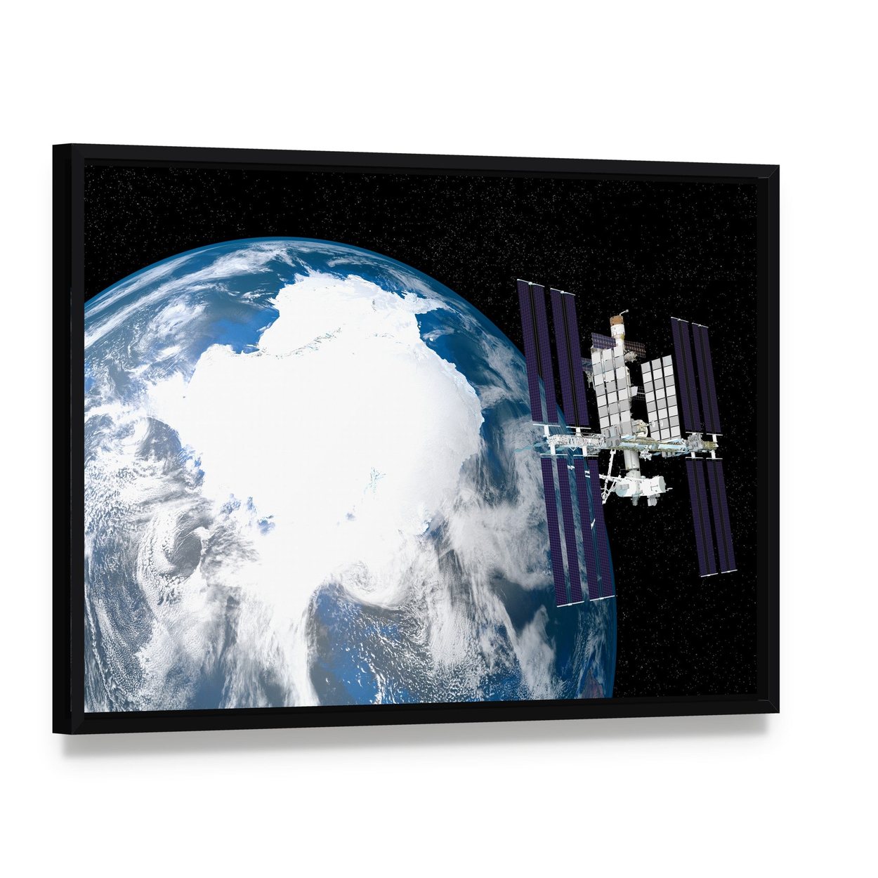 International Space Station Canvas Wall Art, framed canvas in a black floater frame, angled product view