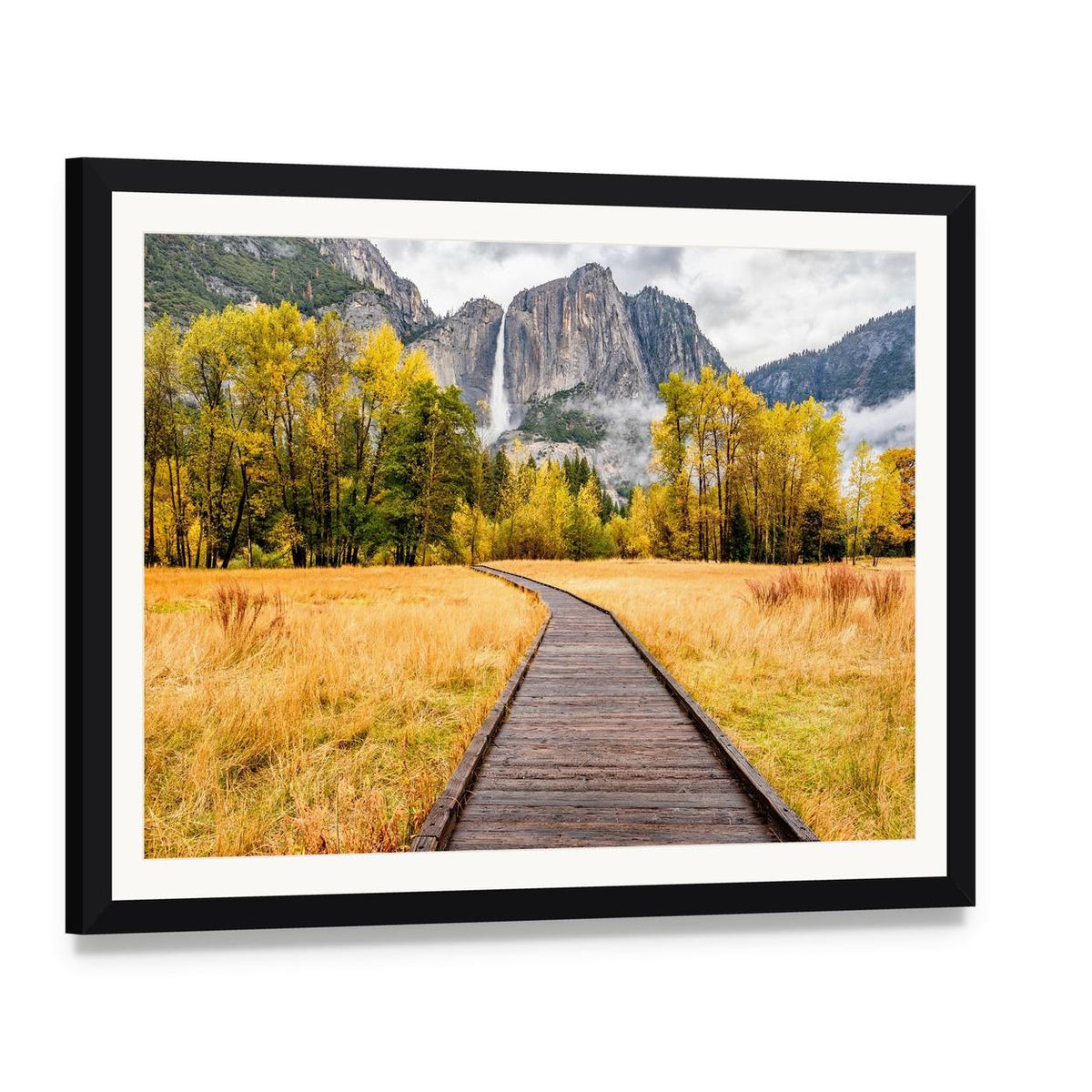 Boardwalk Through Autumn Foliage Canvas Wall Art, framed print with white mat and black frame, angled product view