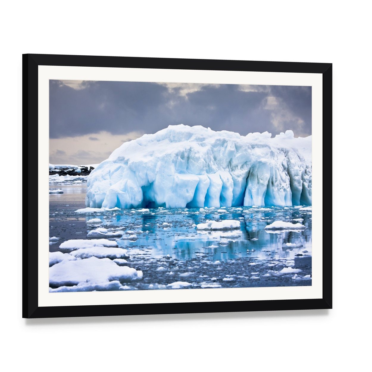 Huge Iceberg in Antarctica Canvas Wall Art, framed print with white mat and black frame, angled product view