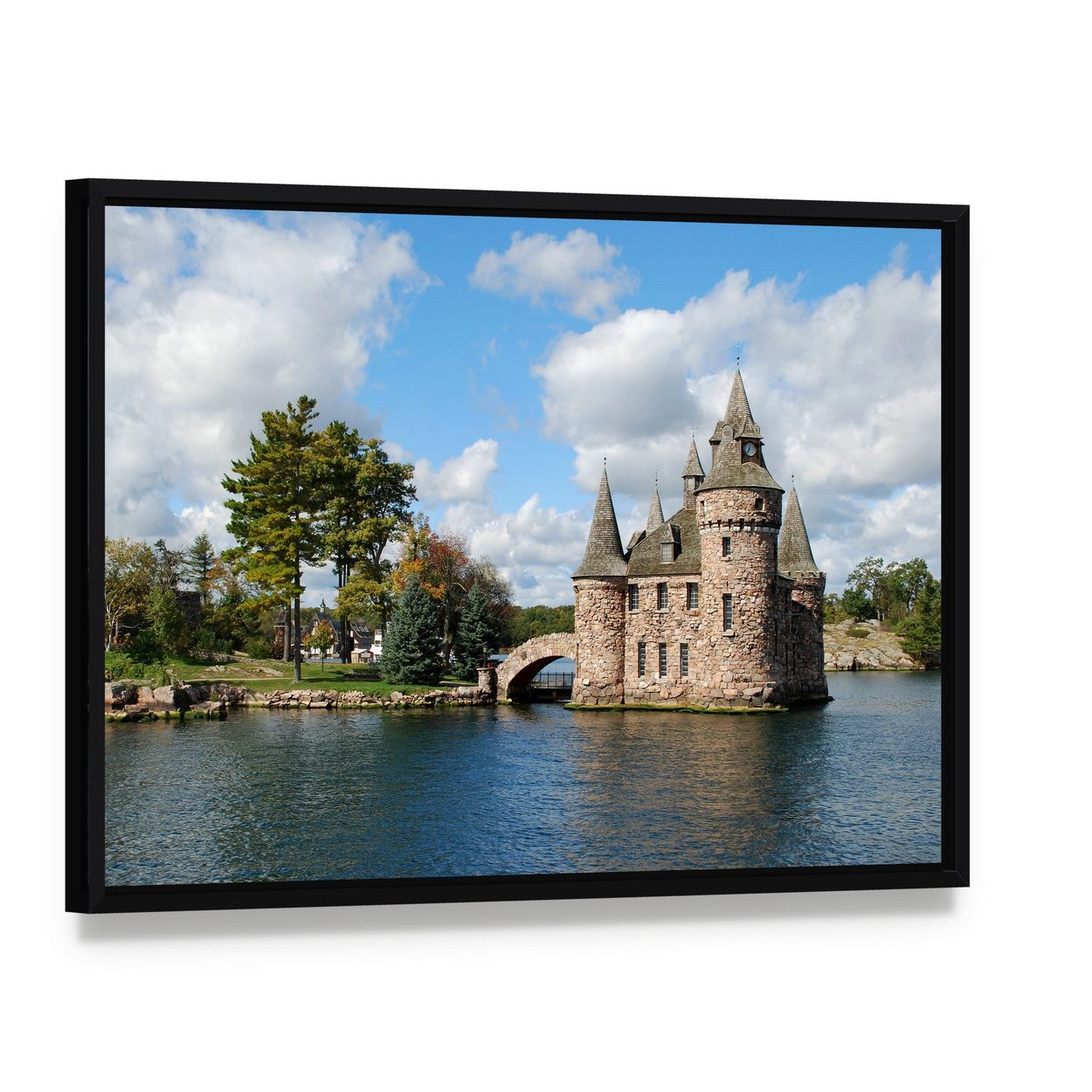 Castle on Heart Island Canvas Wall Art, framed canvas in a black floater frame, angled product view