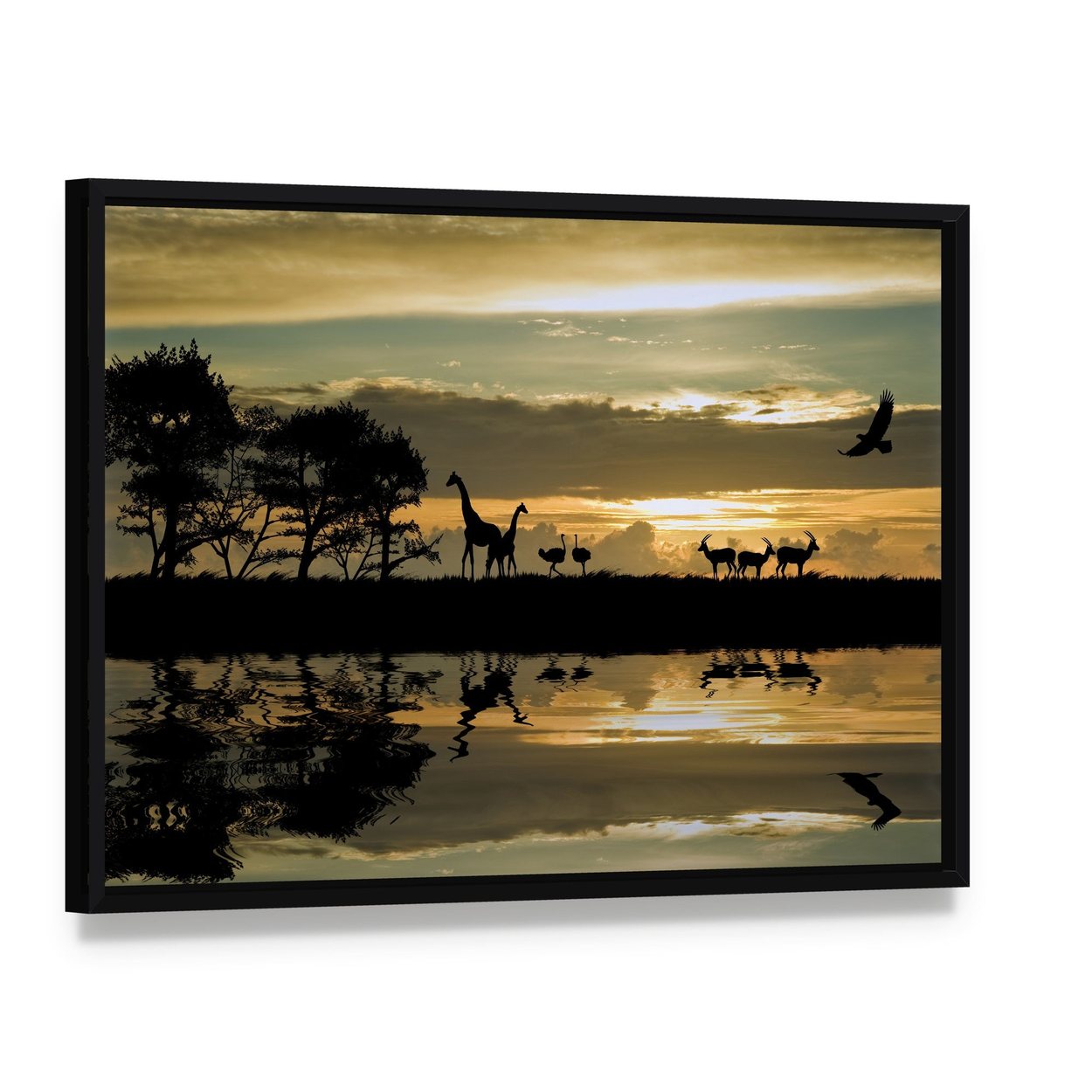 Savanna Animal Silhouettes at Sunset Canvas Wall Art, framed canvas in a black floater frame, angled product view