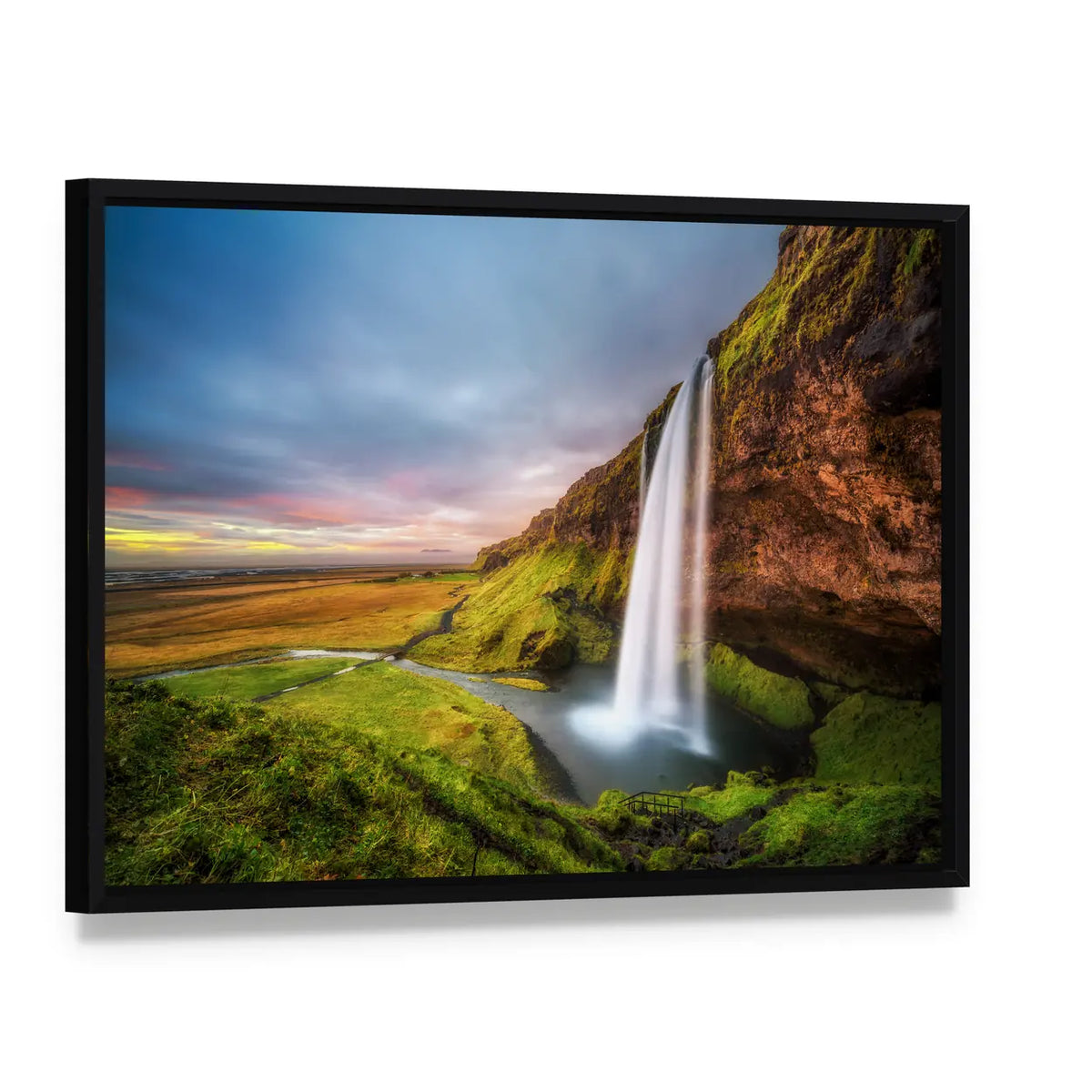 Seljalandsfoss Waterfall At Sunset In Iceland Canvas Wall Art, framed canvas in a black floater frame, angled product view