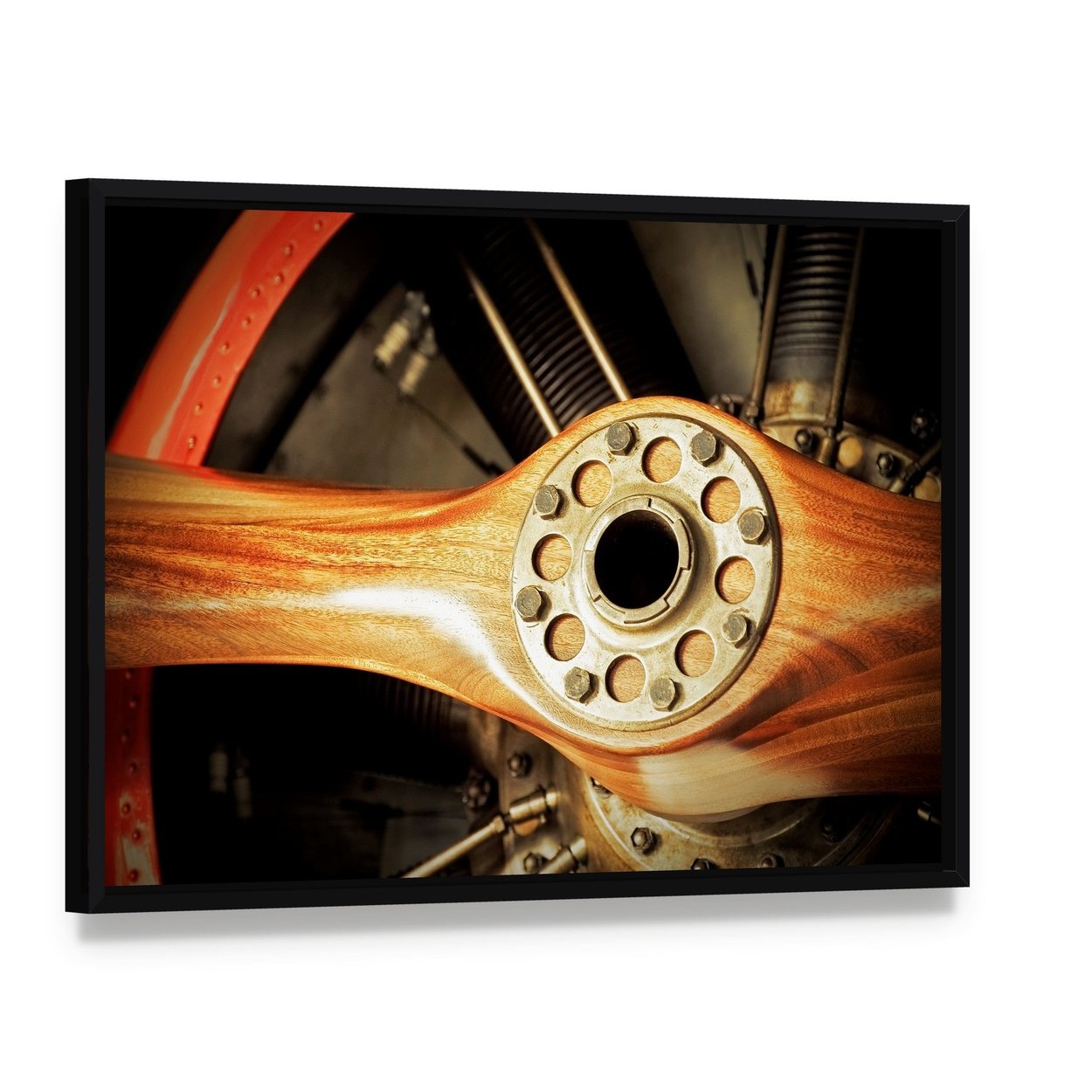 Vintage Wooden Aircraft Propeller and Engine Cylinders Canvas Wall Art, framed canvas in a black floater frame, angled product view