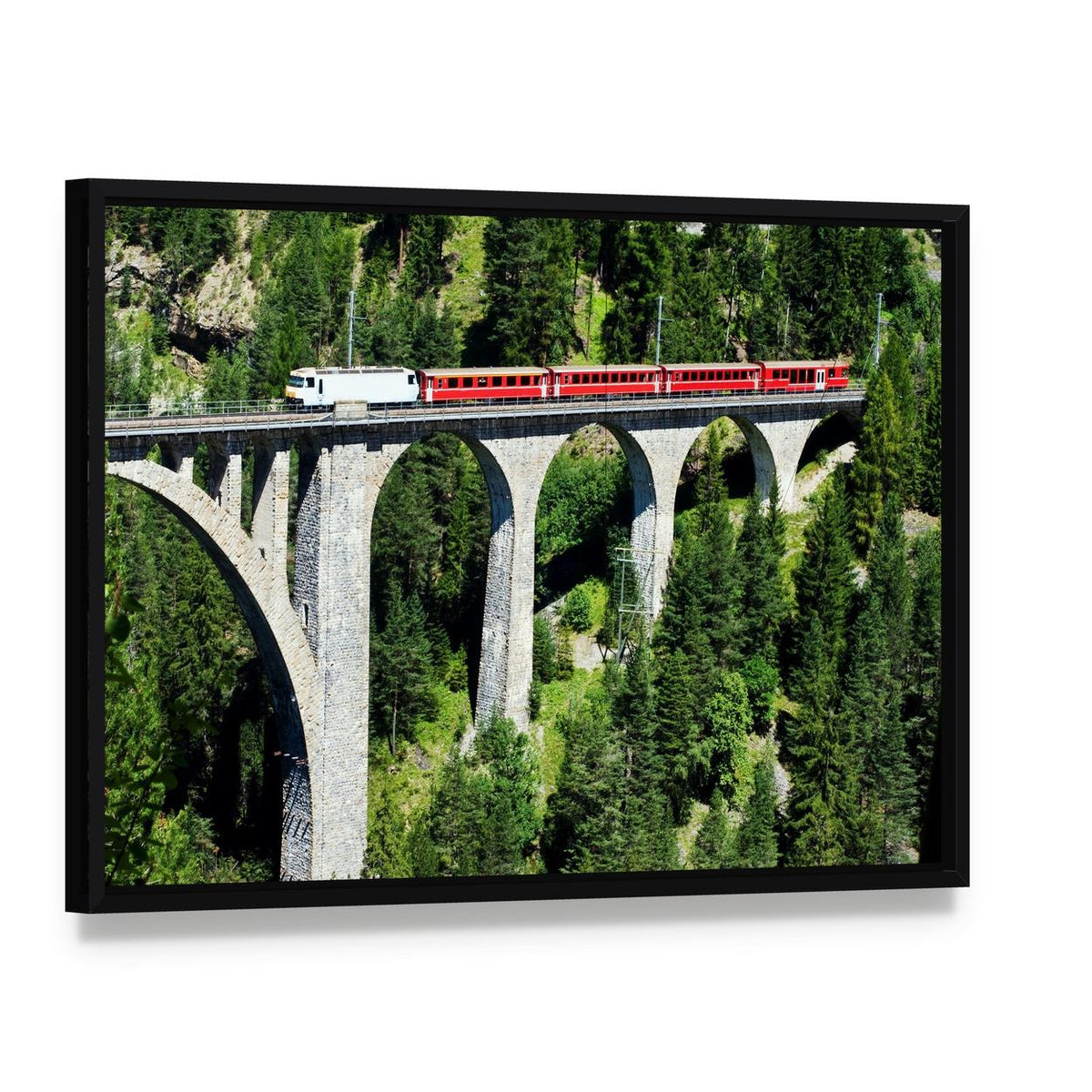 Swiss Train on Bridge Near Wiesen Canvas Wall Art, framed canvas in a black floater frame, angled product view