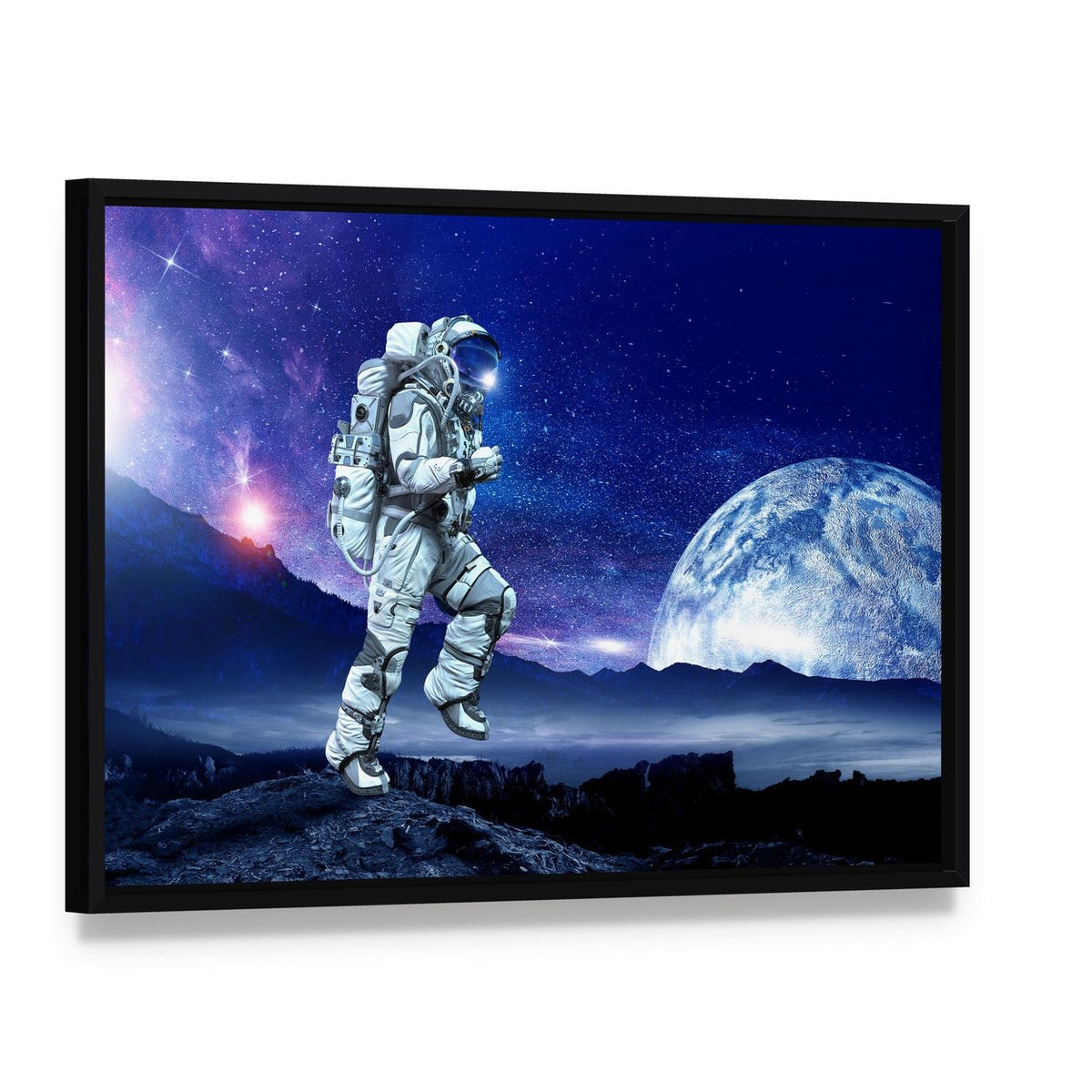 Astronaut Running Beneath a Large Moon Canvas Wall Art, framed canvas in a black floater frame, angled product view