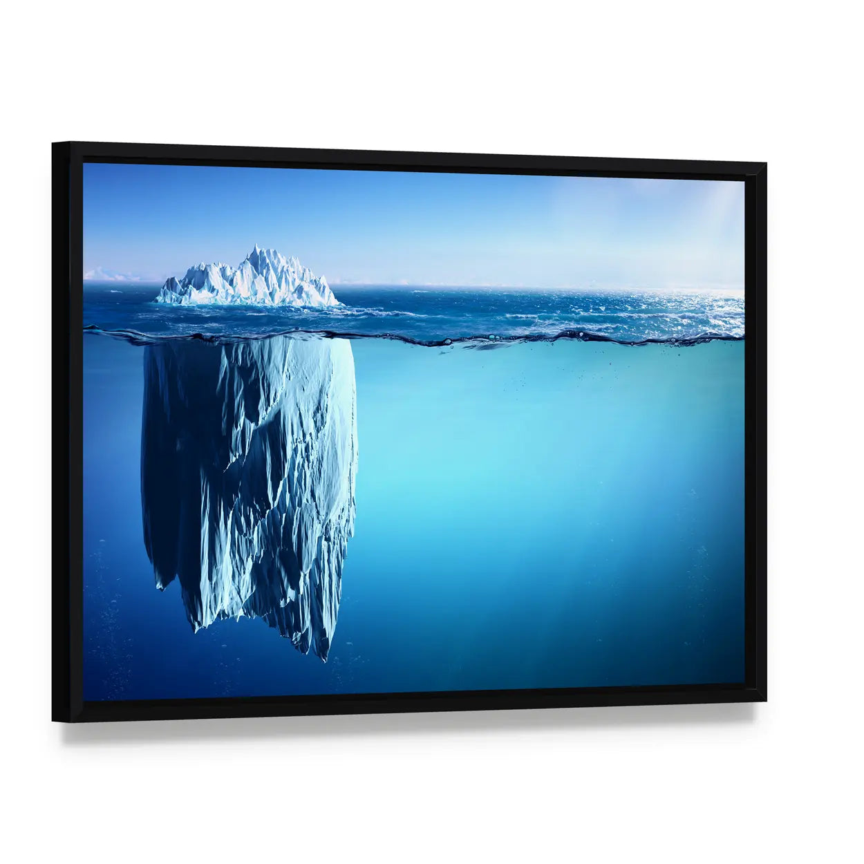 Iceberg Floating On Sea Canvas Wall Art, framed canvas in a black floater frame, angled product view