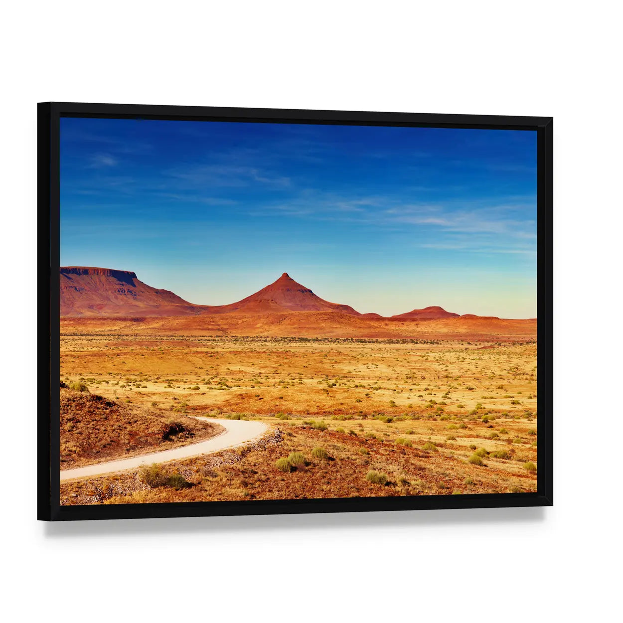 Winding Desert Road to Distant Peaks Canvas Wall Art, framed canvas in a black floater frame, angled product view
